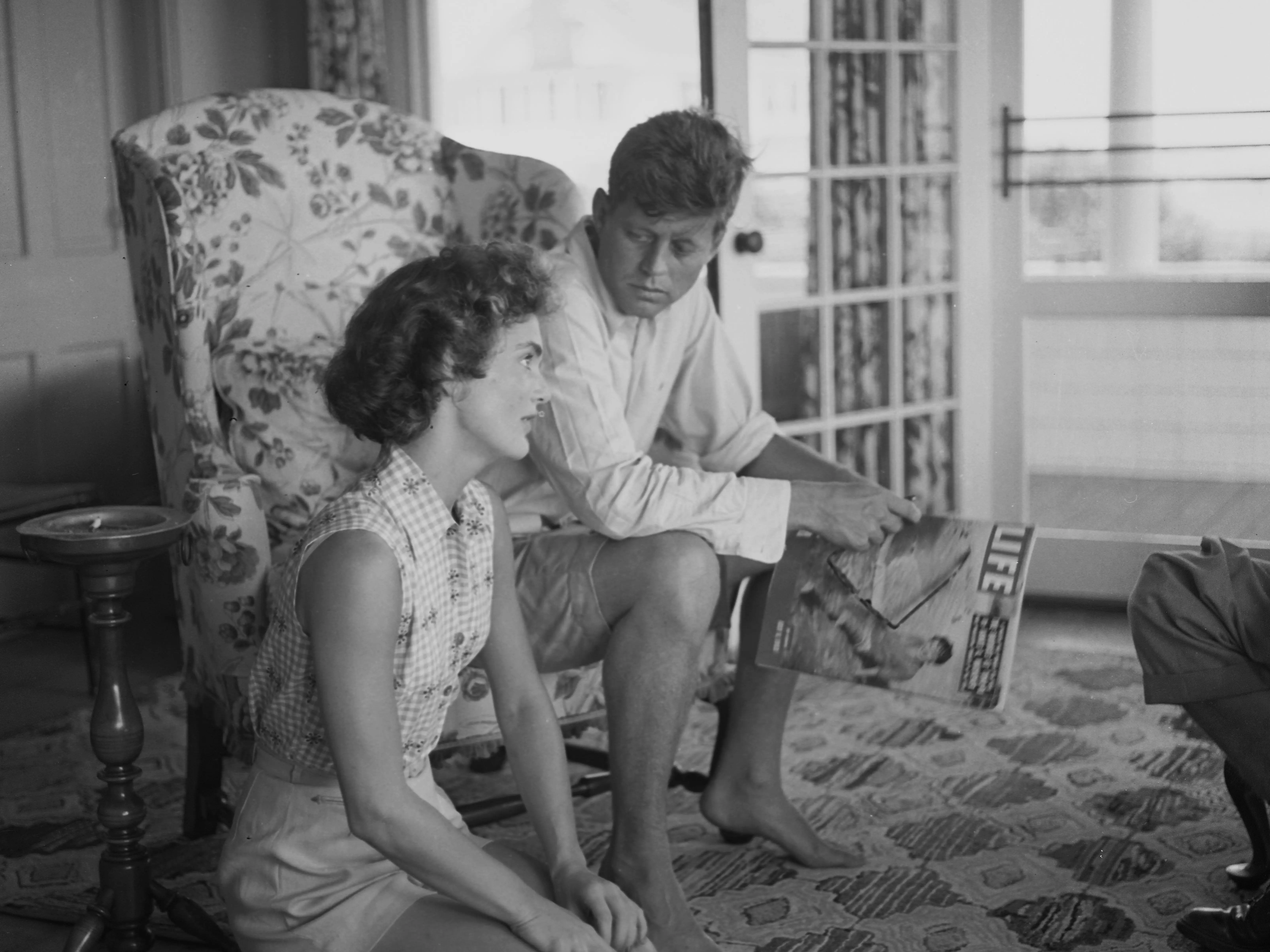 Senator John F. Kennedy and fiance Jacqueline Bouvier are interviewed for a LIFE Magazine story while on vacation at the Kennedy compound in June 1953 in Hyannis Port, Massachusetts.