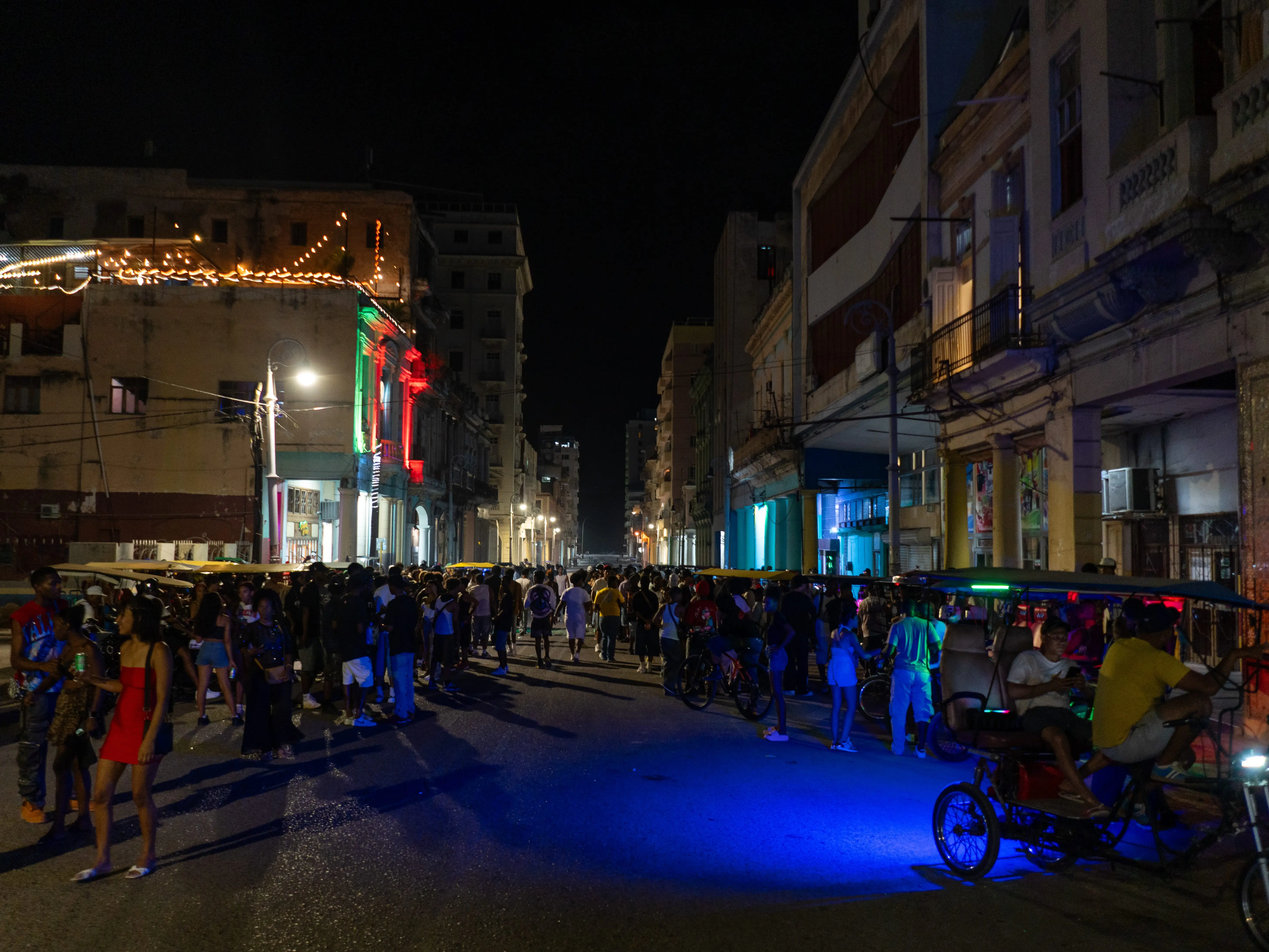 People gather at bars and along the streets as nightlife continues during ongoing blackouts in Havana, Cuba, on May 9, 2026. Cuba continues to face severe electricity shortages and fuel scarcity amid a deepening economic crisis.