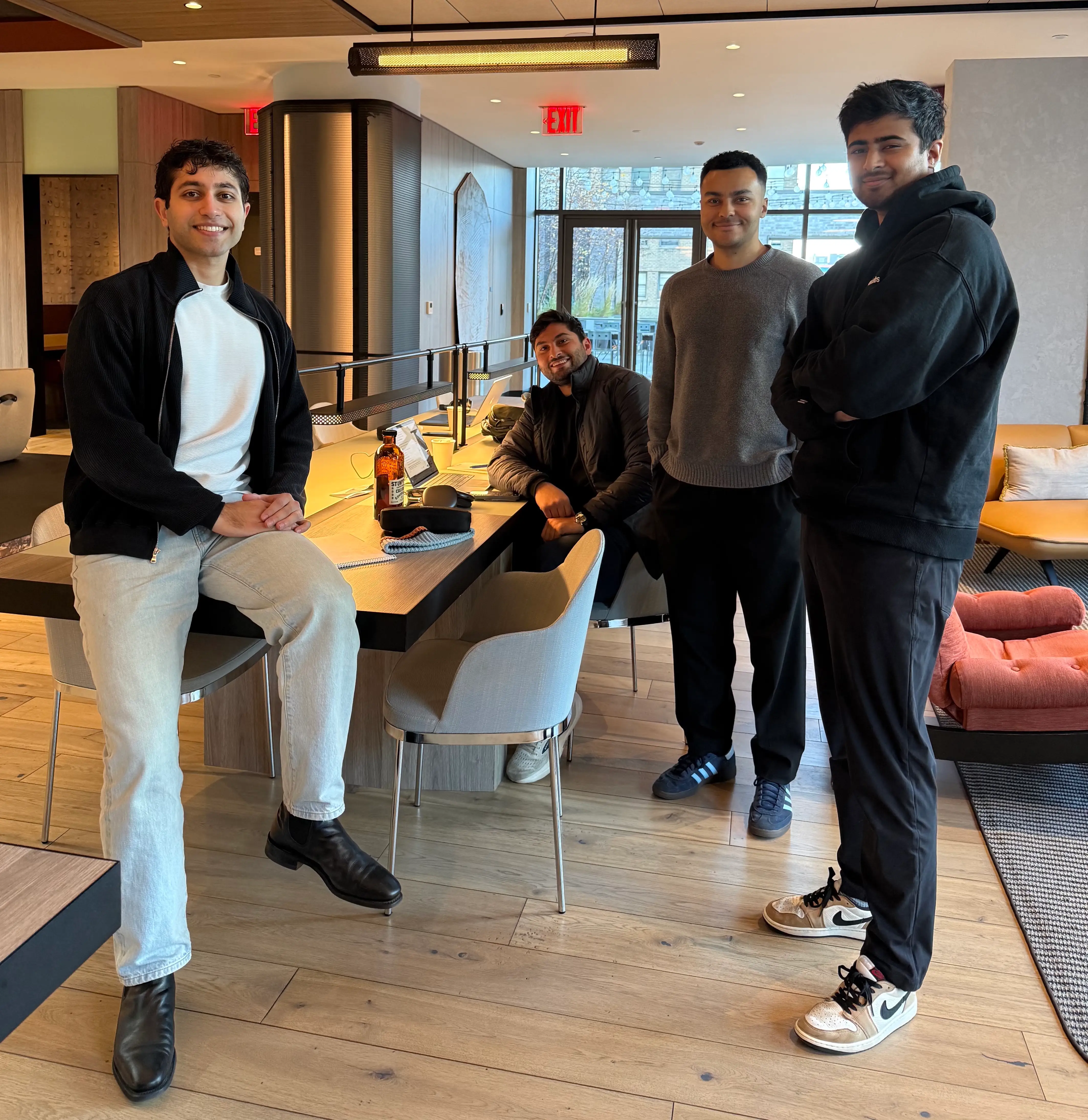 Petra Labs staff is pictured in Sami Akkawi's apartment's coworking space.