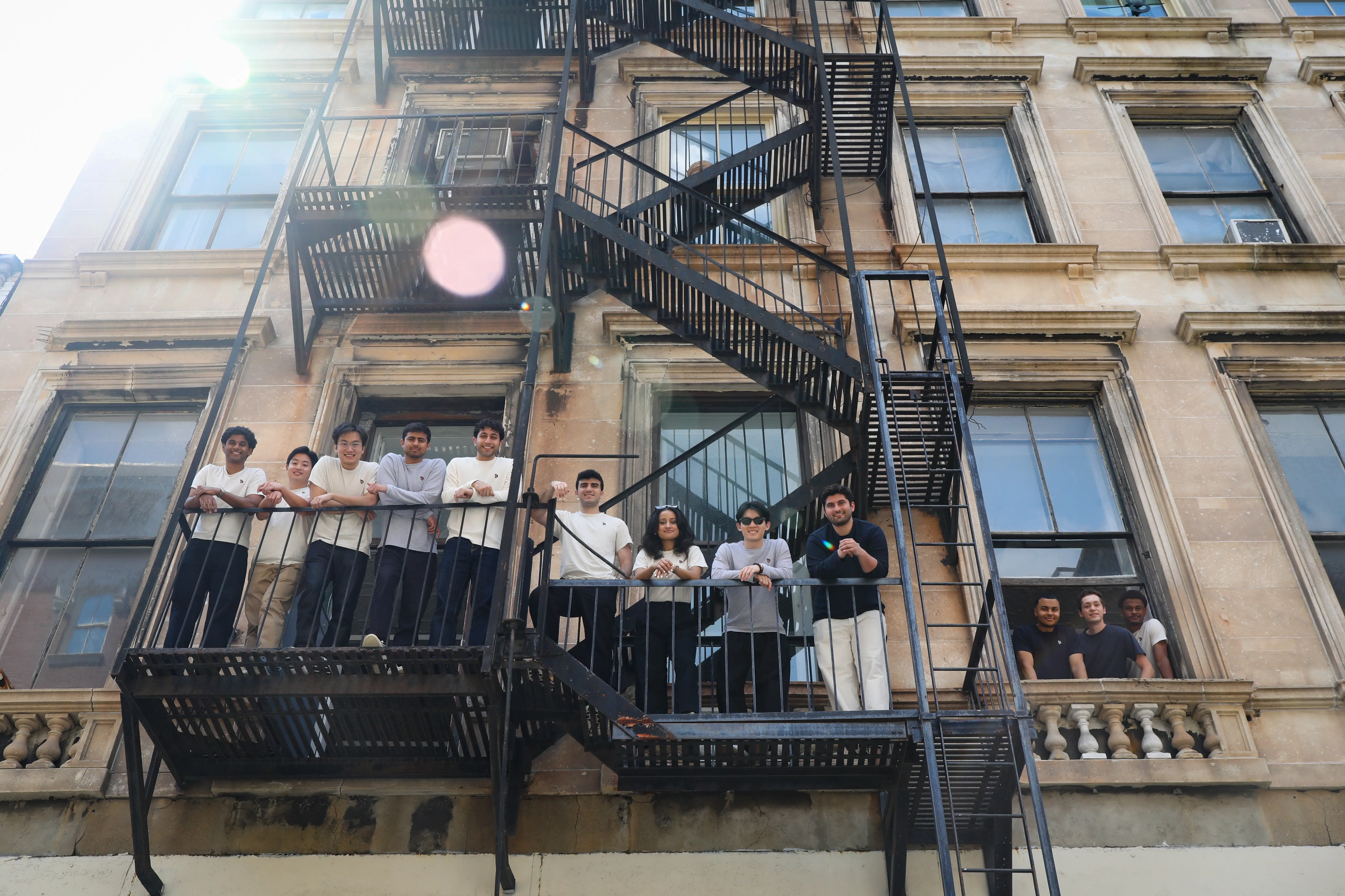 The Petra Labs team is pictured on its fire escape.