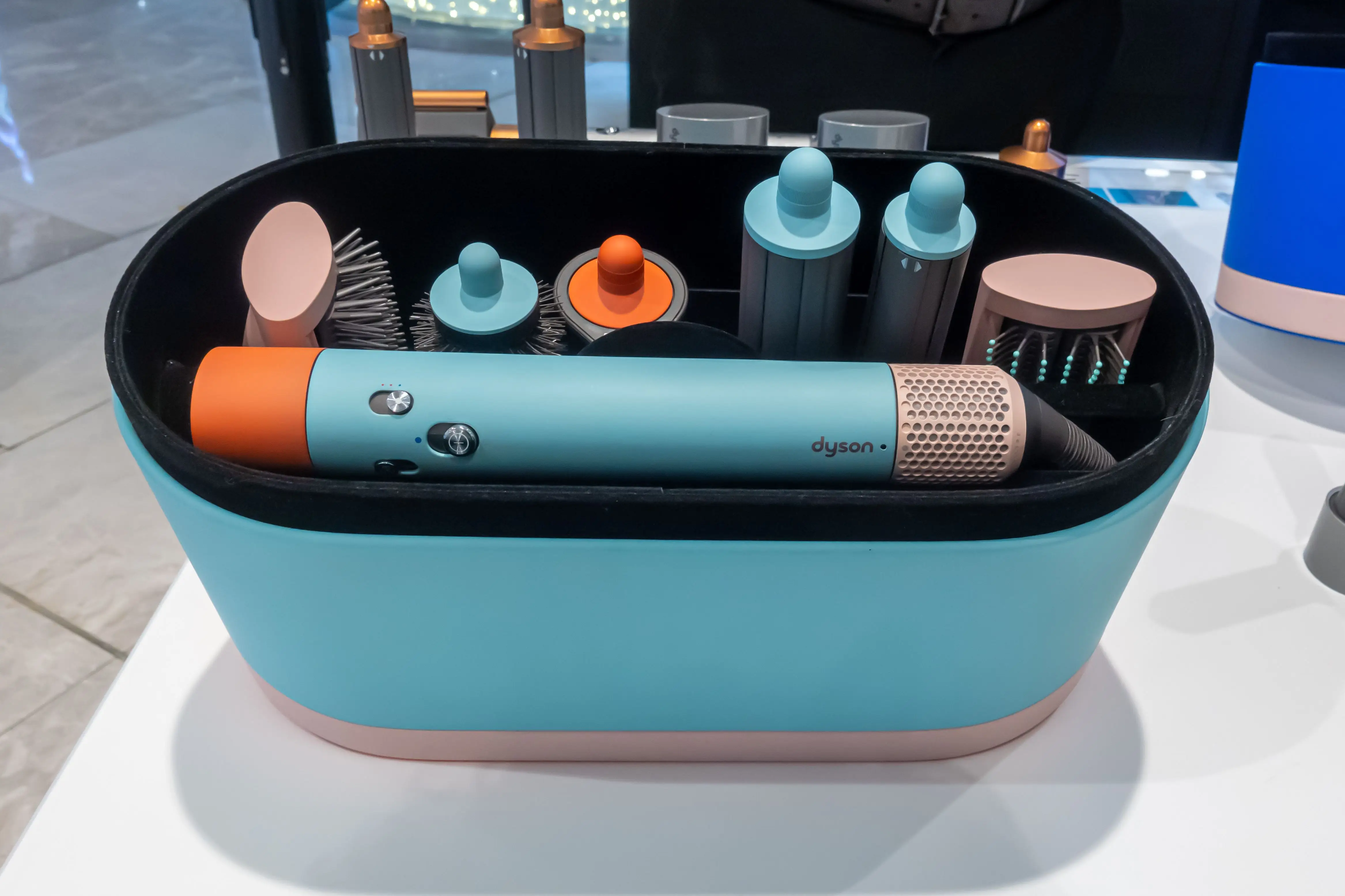 A bag with multiple Dyson hair products