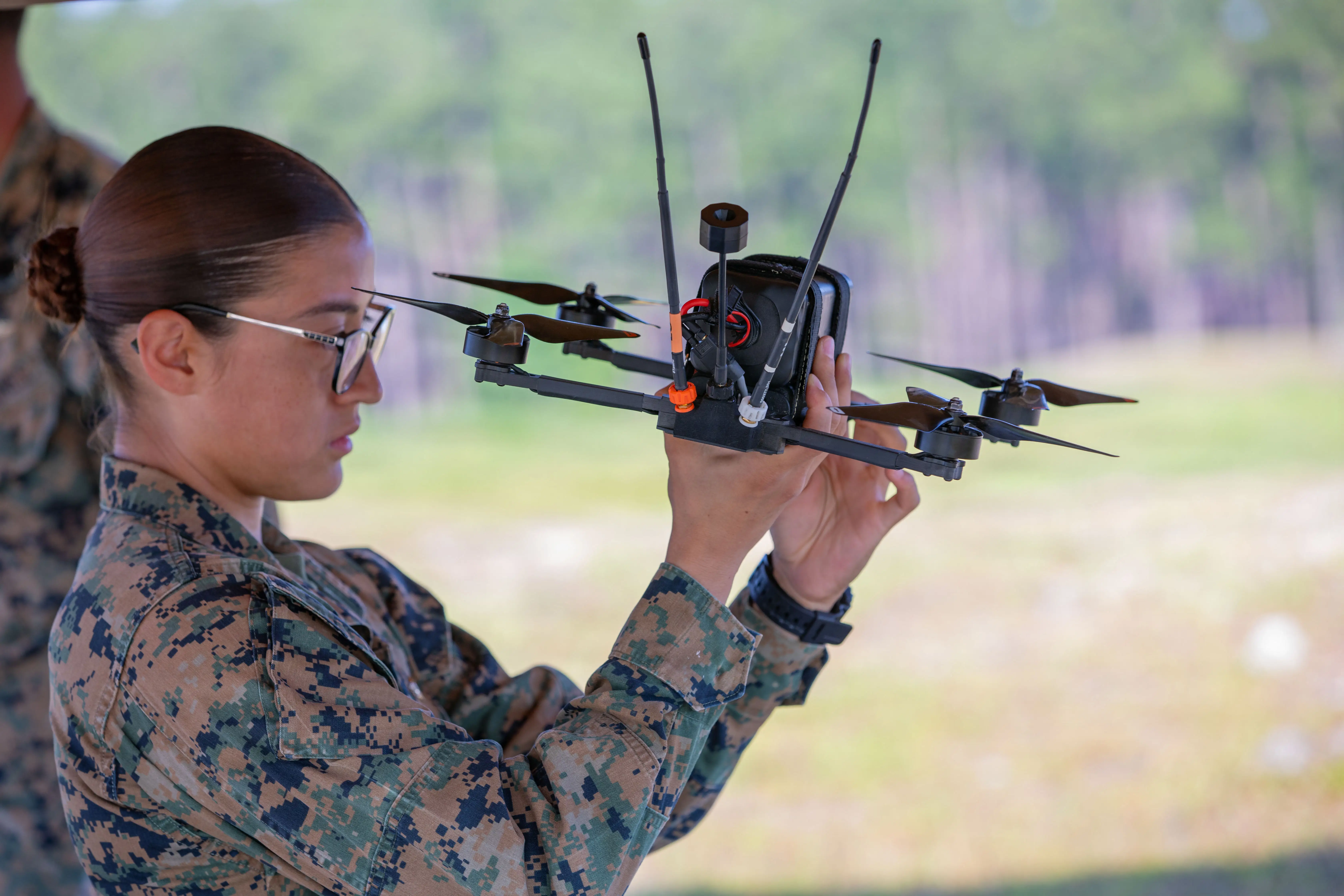A Marine instructor at an east coast infantry school checks a Neros Archer drone on Camp Lejeune, North Carolina, July 9, 2026.