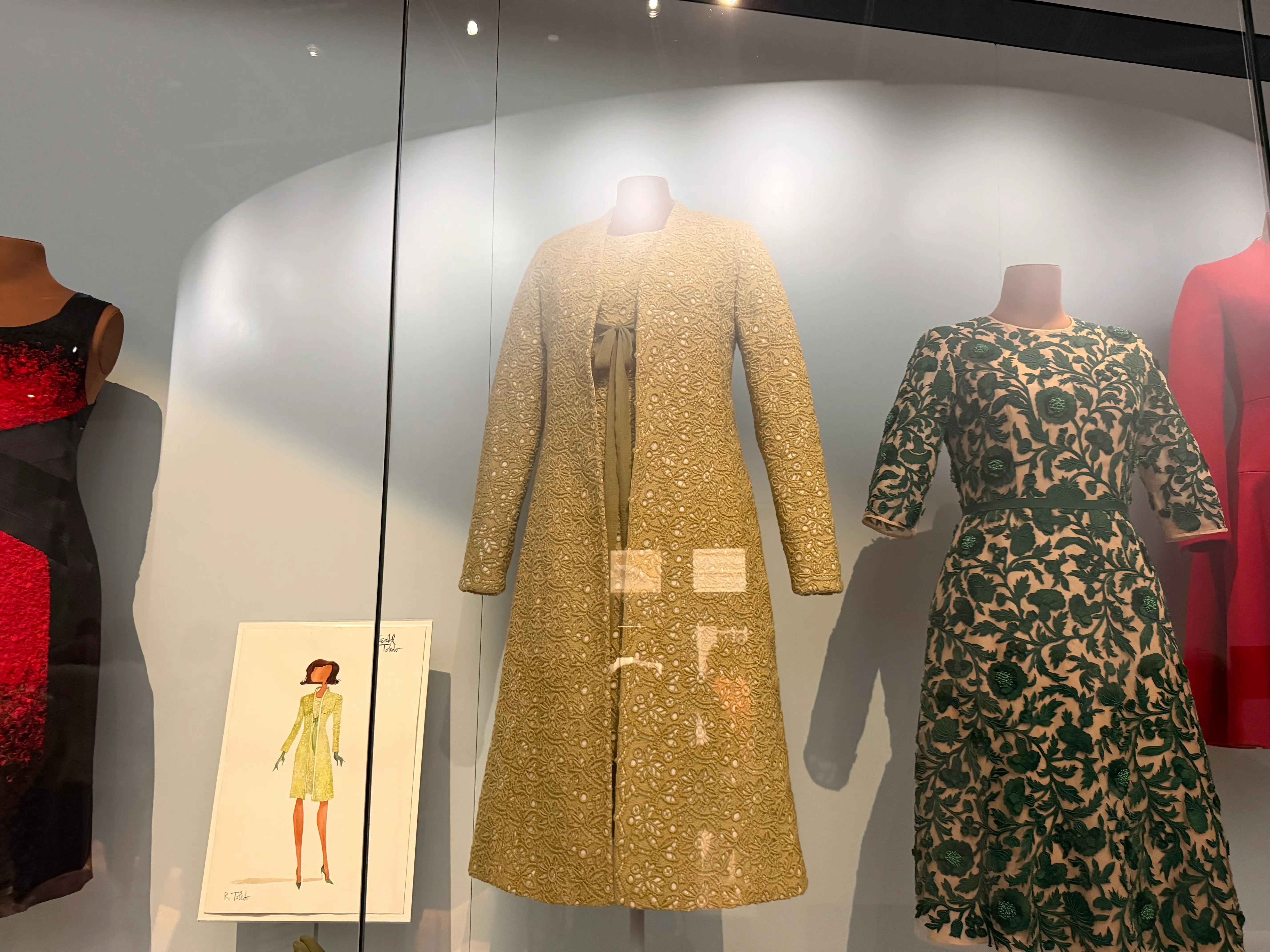 Michelle Obama Isabel Toledo coat worn on 2009 Inauguration on display at the Obama Presidential Center in Chicago.