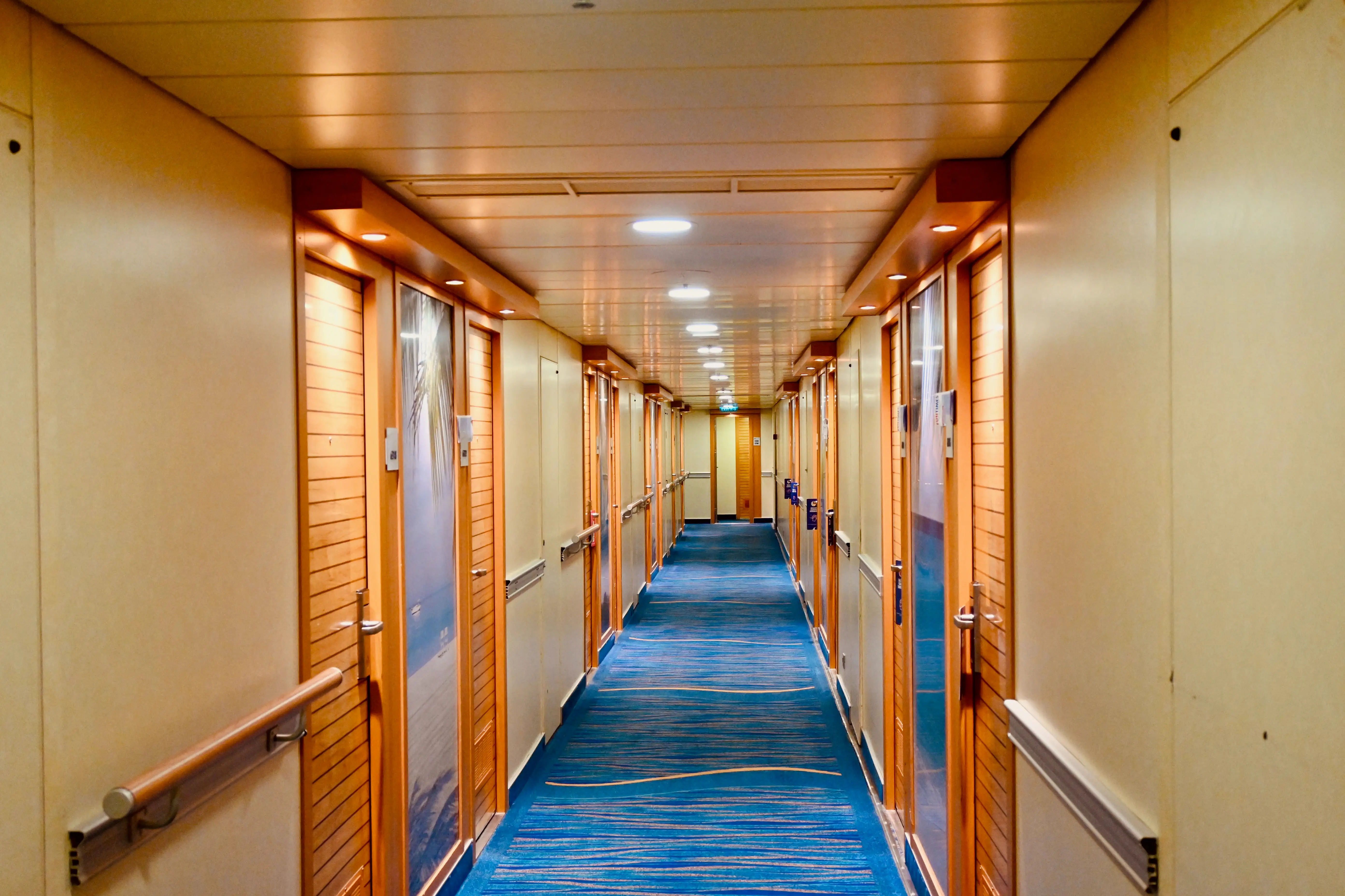Hallway of doors on Carnival Sunshine cruise ship