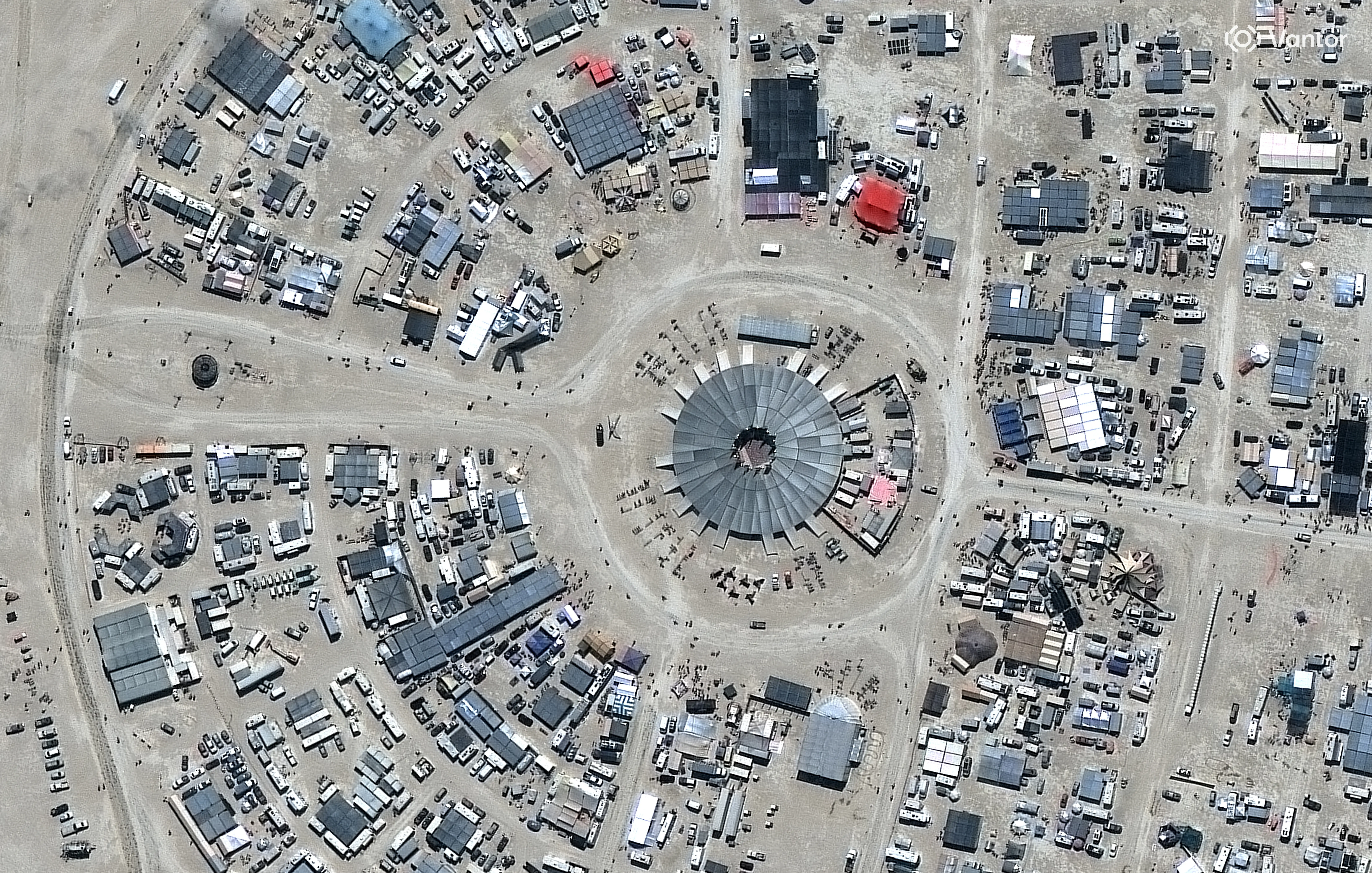 Vantor satellite image shows the center of the Burning Man festival site in Black Rock City with its distinctive circular layout and numerous temporary structures. Please use: Satellite image (c) 2026 Vantor.