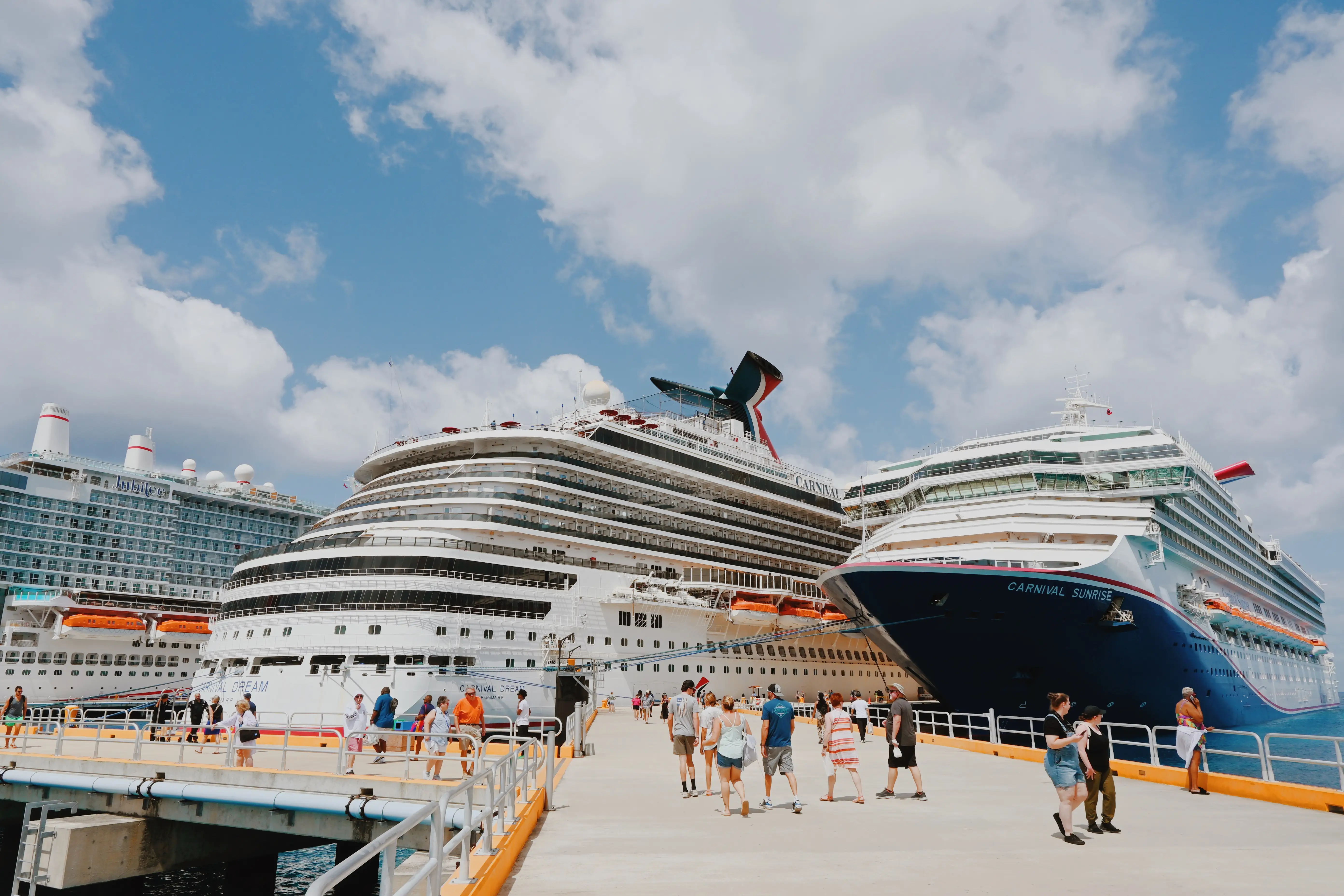 Cruise ships docked at pier