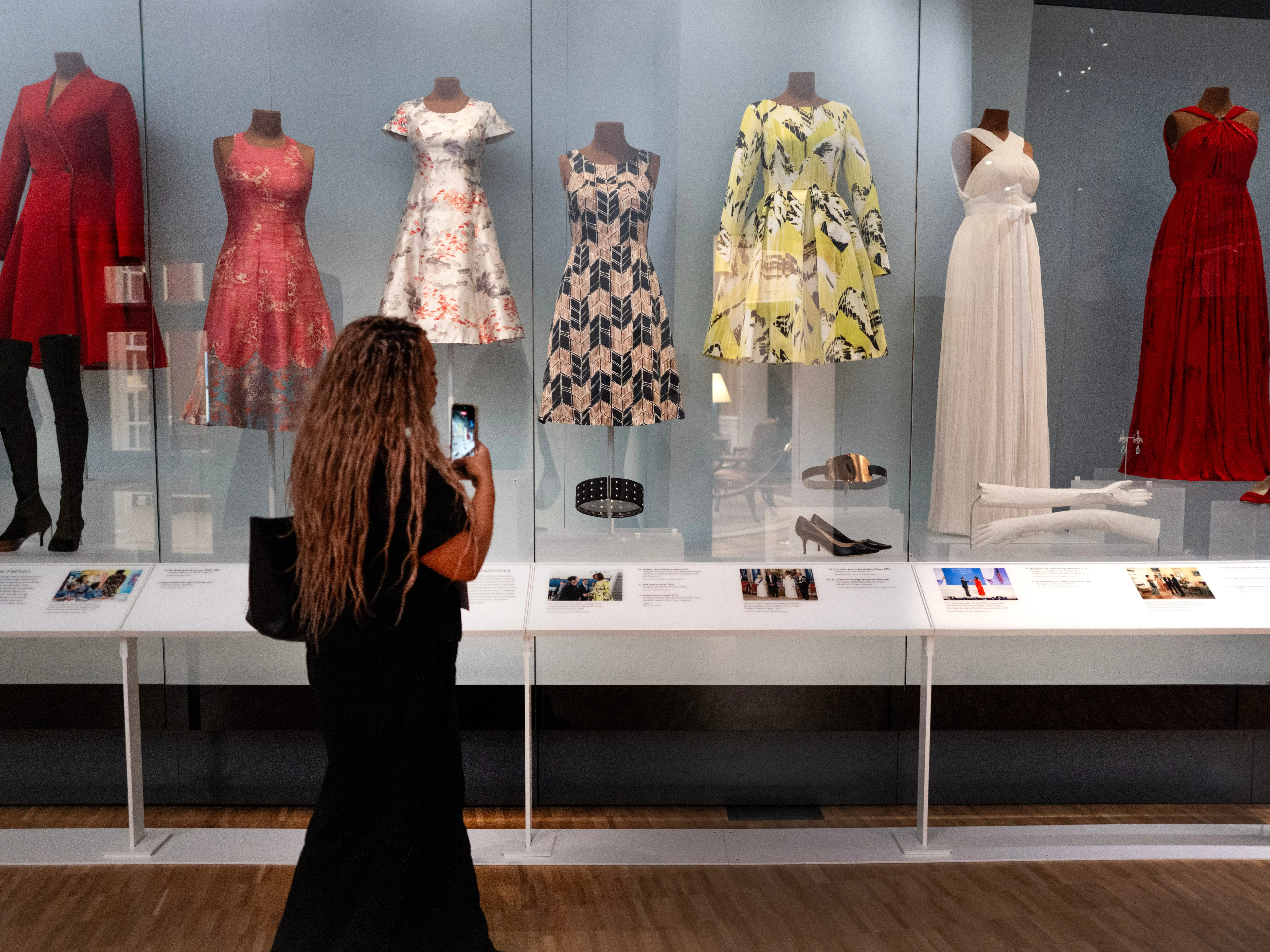 Dresses worn by former first lady Michelle Obama are displayed in the museum at the Obama Presidential Center on June 03, 2026 in Chicago, Illinois. The Obama Presidential Center, which includes a museum, Library, playground and basketball court, opens to the public on June 19.