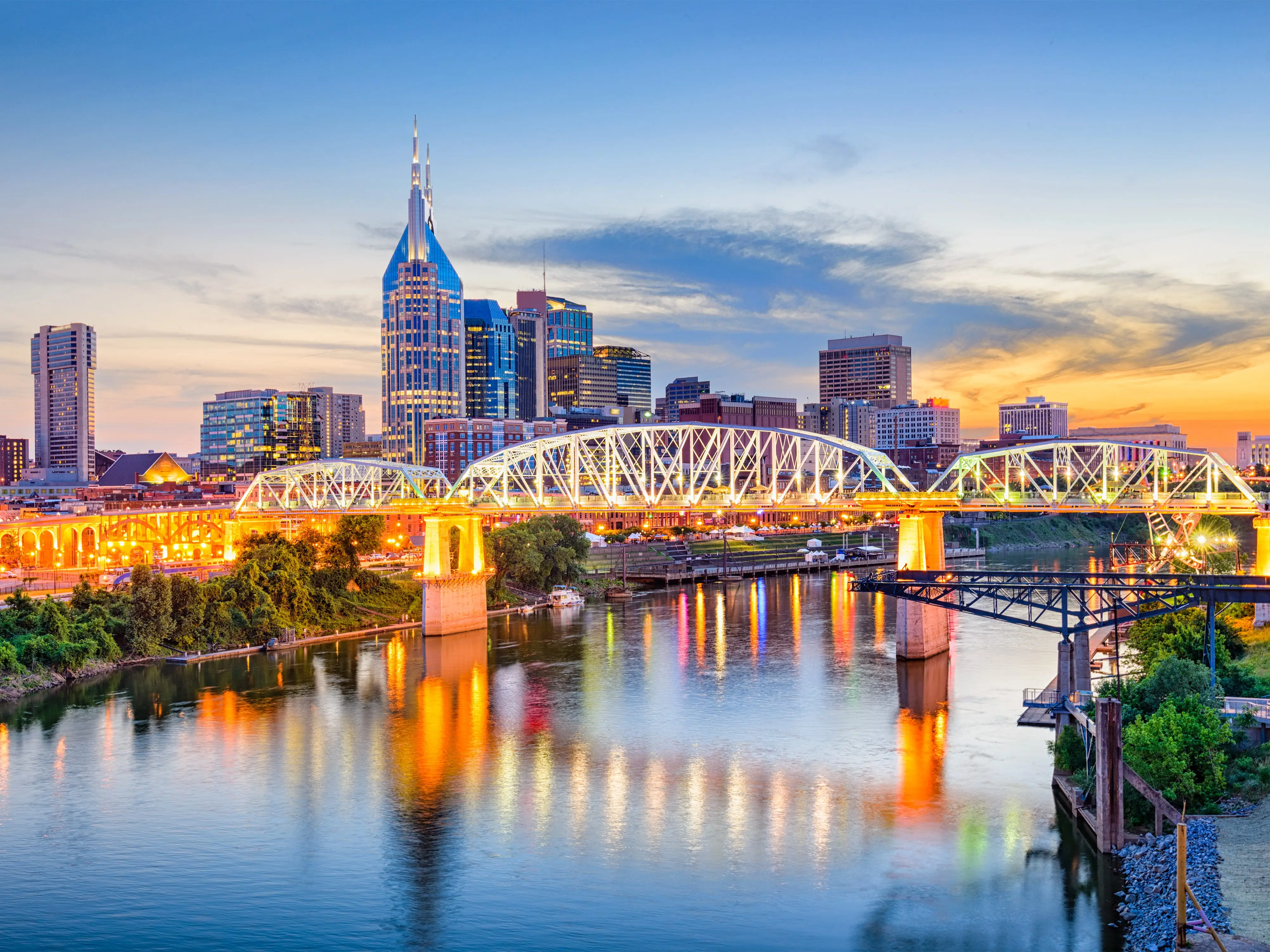 Nashville, Tennessee, USA downtown skyline on the Cumberland River.