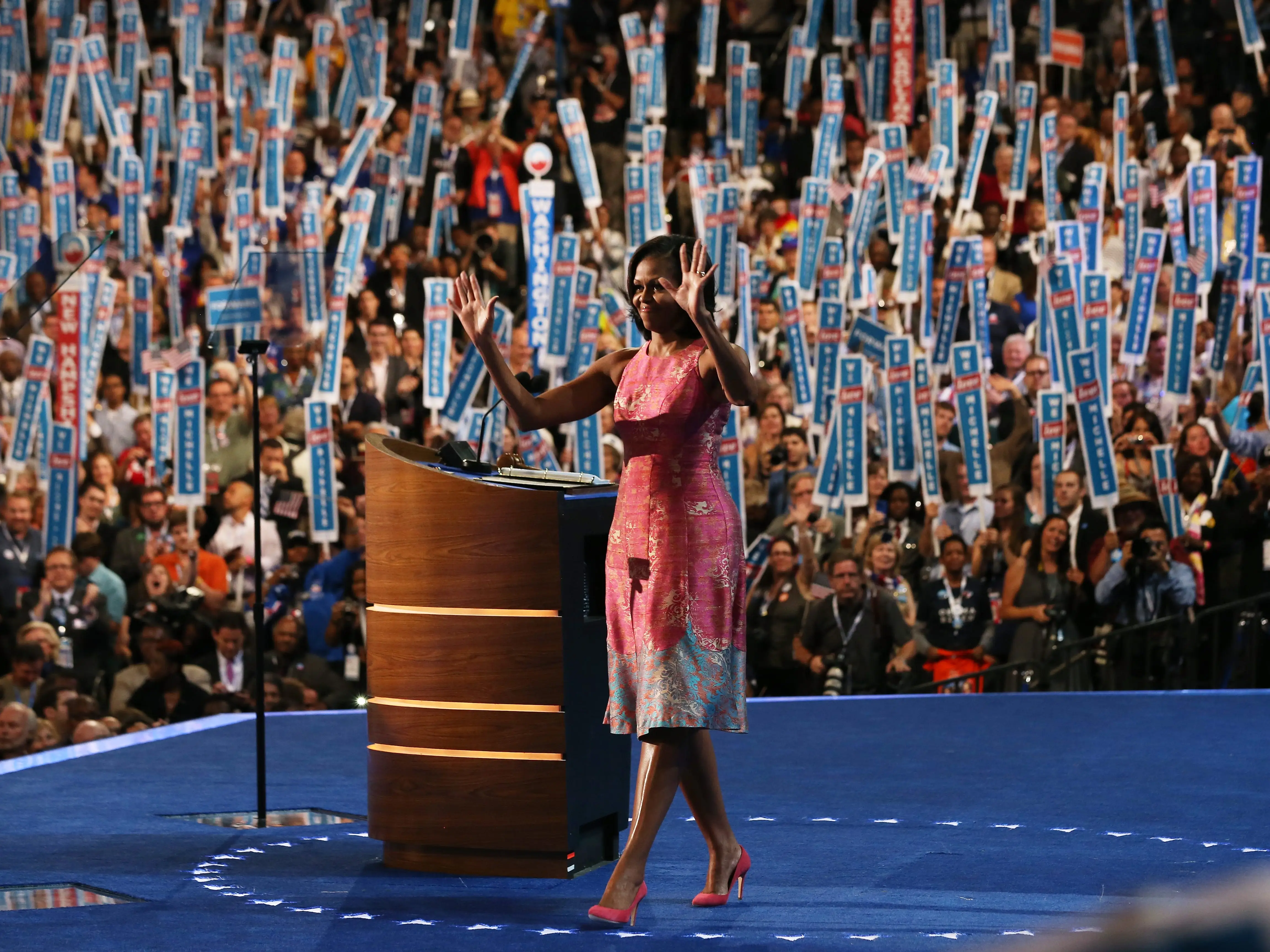 First lady Michelle Obama waves on stage after speaking during day one of the Democratic National Convention at Time Warner Cable Arena on September 4, 2012 in Charlotte, North Carolina.