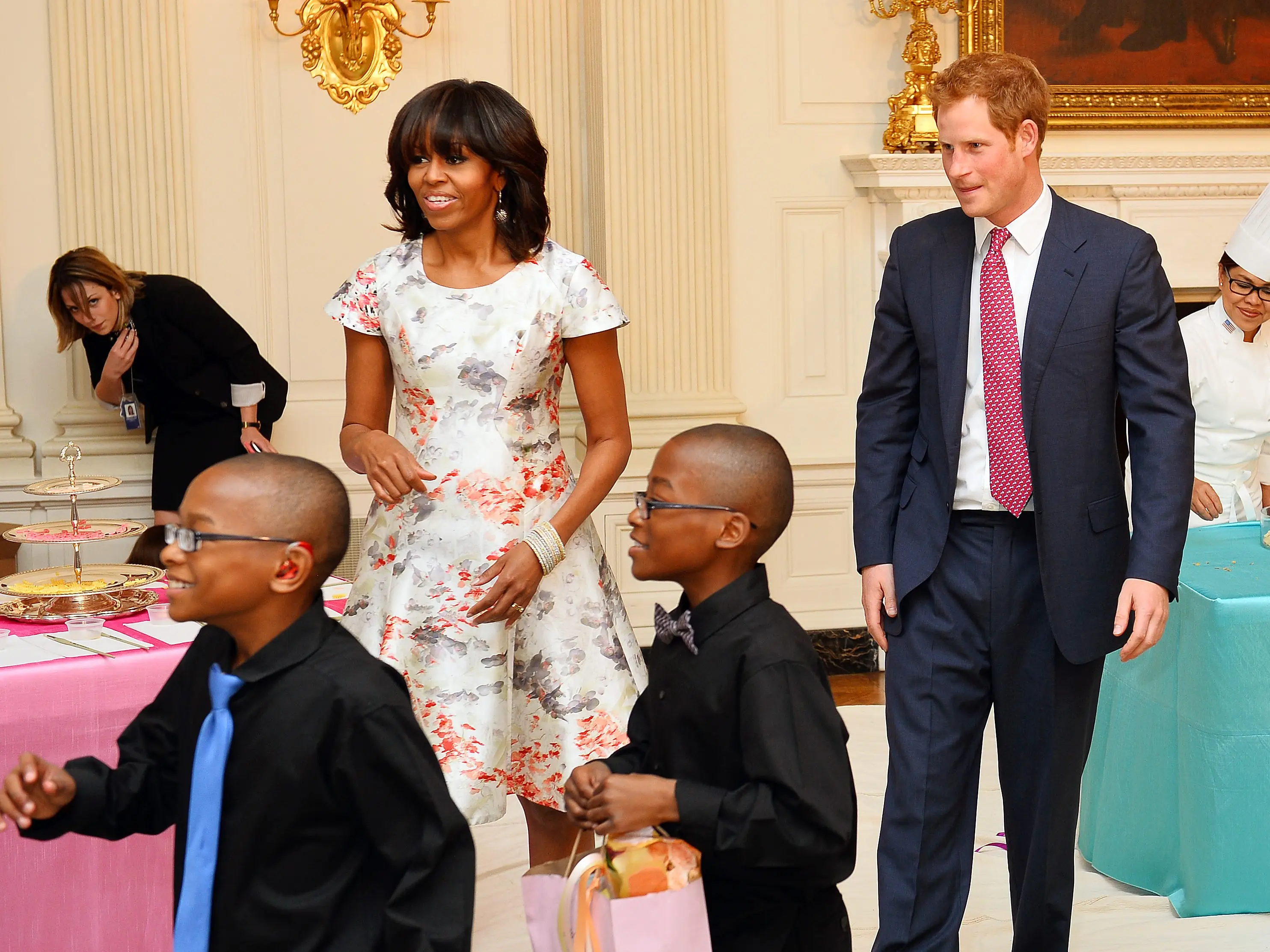 HRH Prince Harry and first lady Michelle Obama prepare to attend an event to honor military families at the White House during the first day of his visit to the United States on May 9, 2013 in Washington, DC.