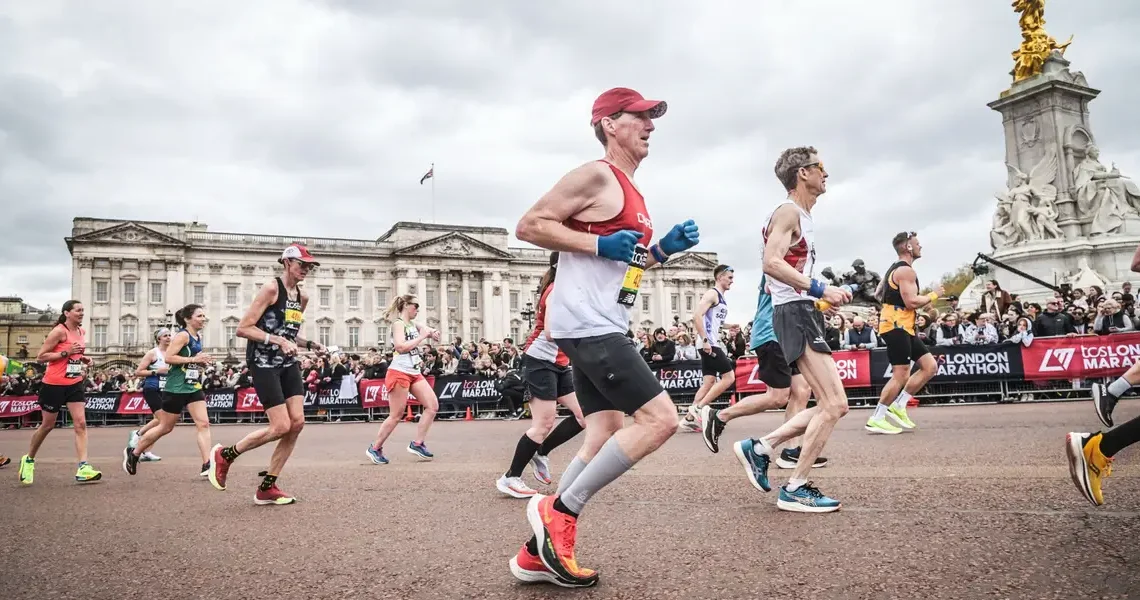 One runner spent $40,000, another took a second job. Marathoners are making big sacrifices to chase medals worldwide.