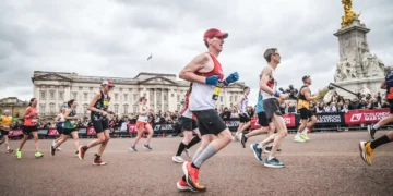 One runner spent $40,000, another took a second job. Marathoners are making big sacrifices to chase medals worldwide.