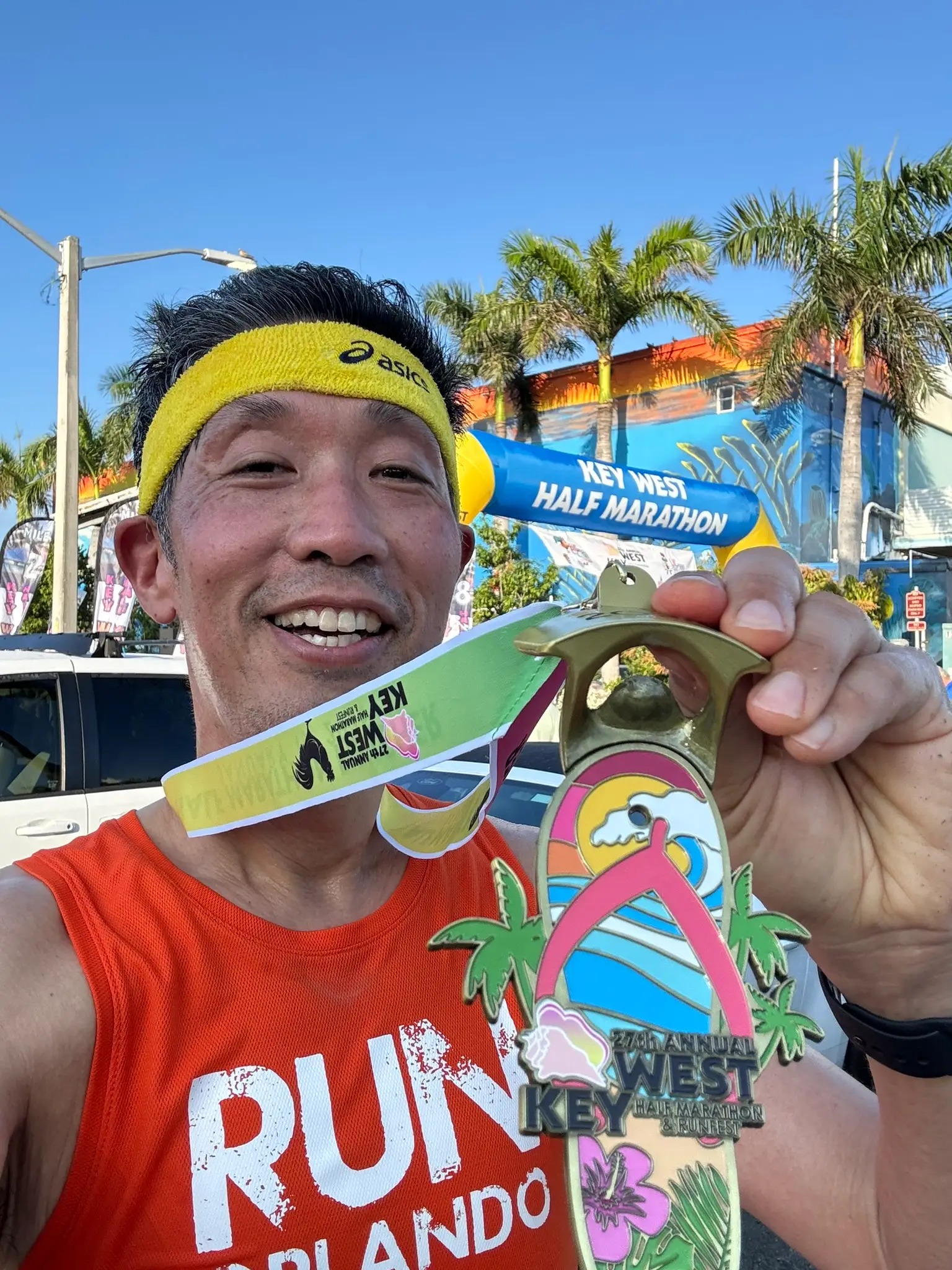 Vincent Hsu with a marathon medal