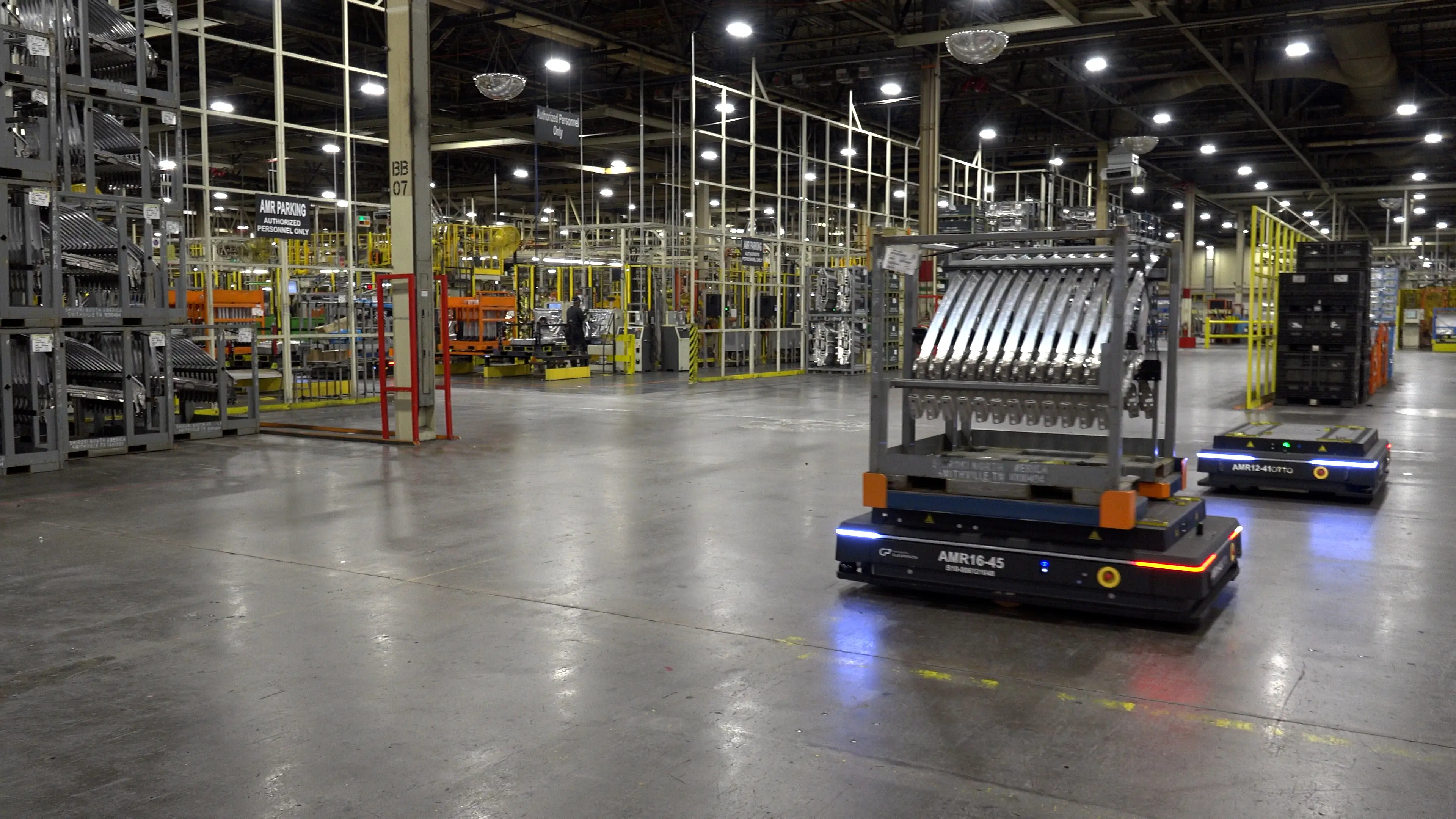 Two AMRs are driving through Nissan's Smyrna plant.