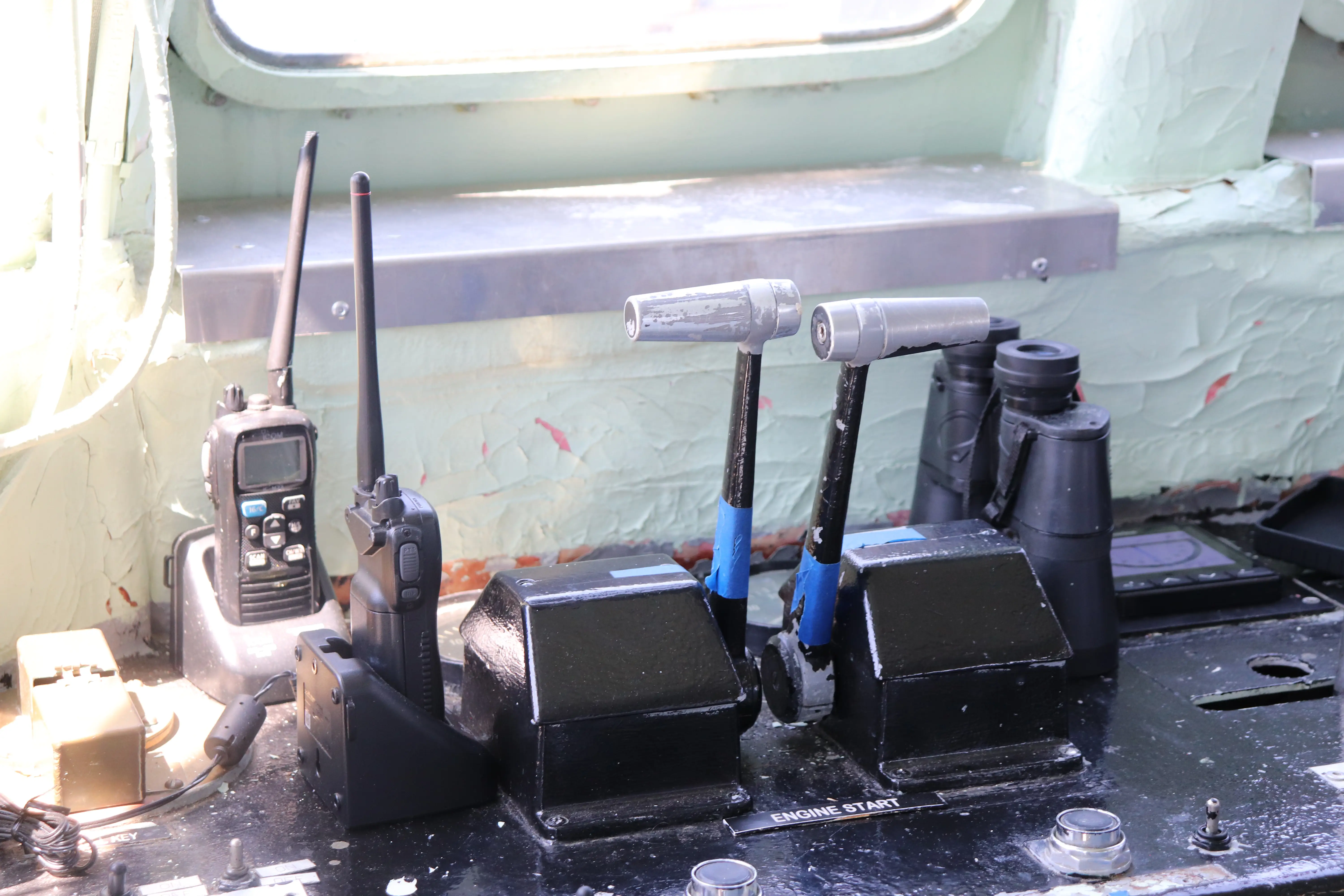 These levers are used by the lead helmsman to control the port and starboard engines on YP 700.