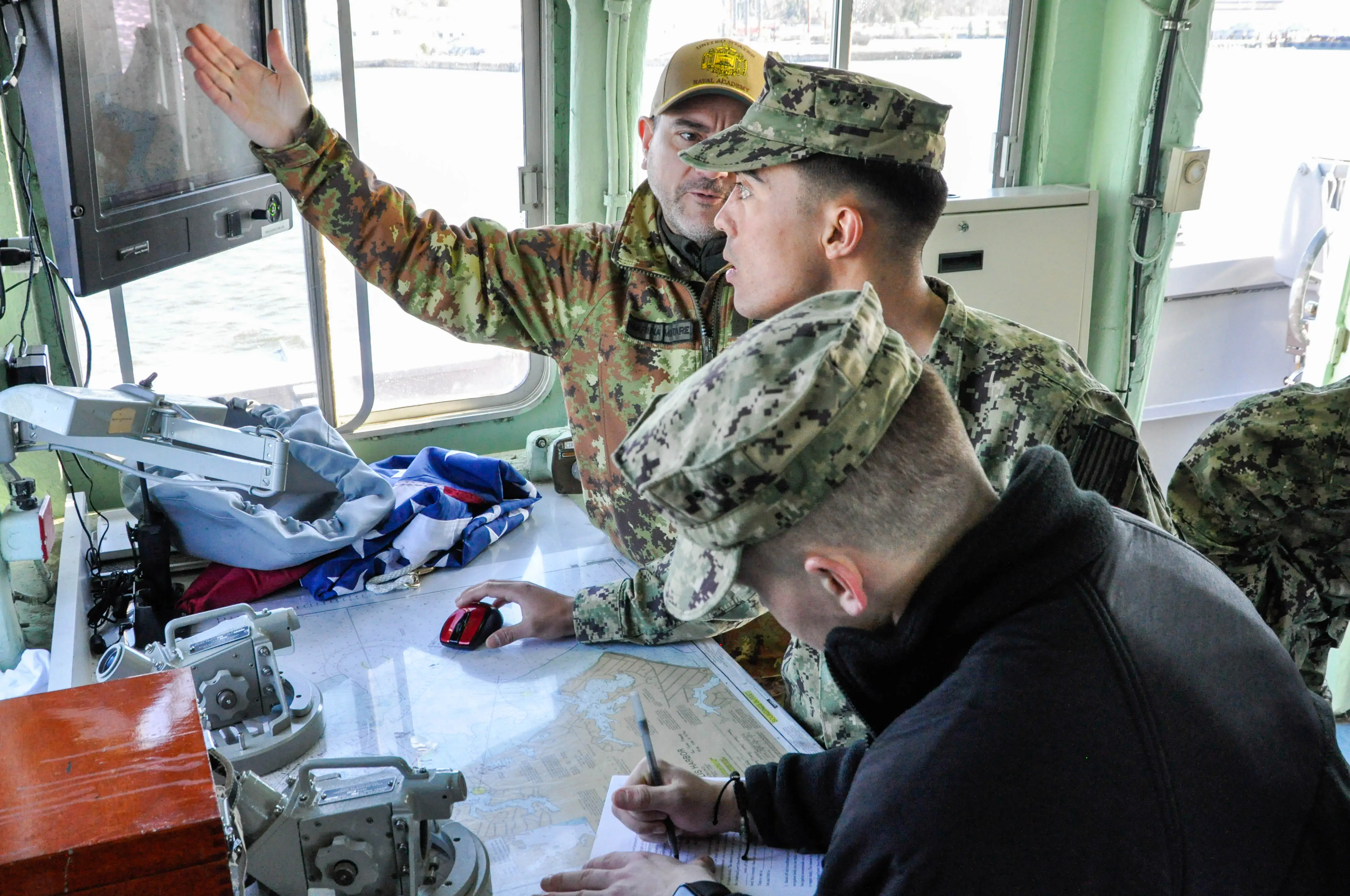 A basic navigation course aboard a yard patrol boat at the US Naval Academy.