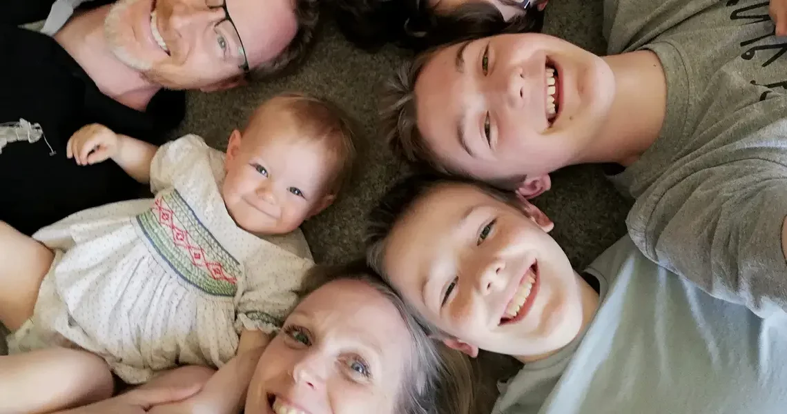 My partner and I had 4 boys between us. Our surprise daughter brought our blended families together.