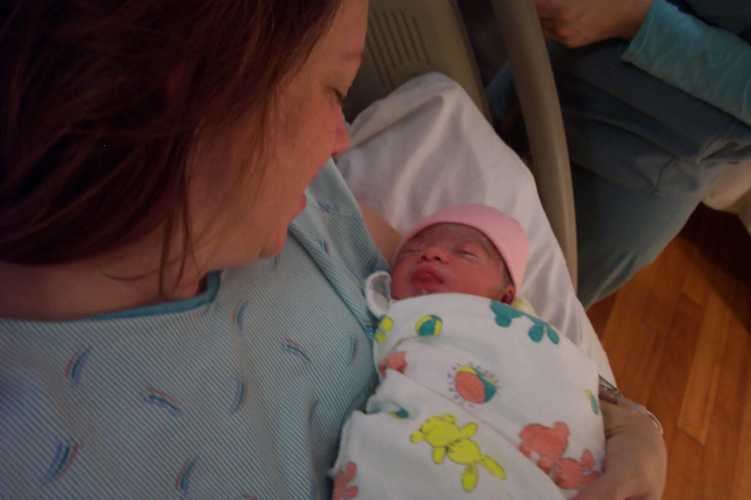 the author holding her newborn daughter