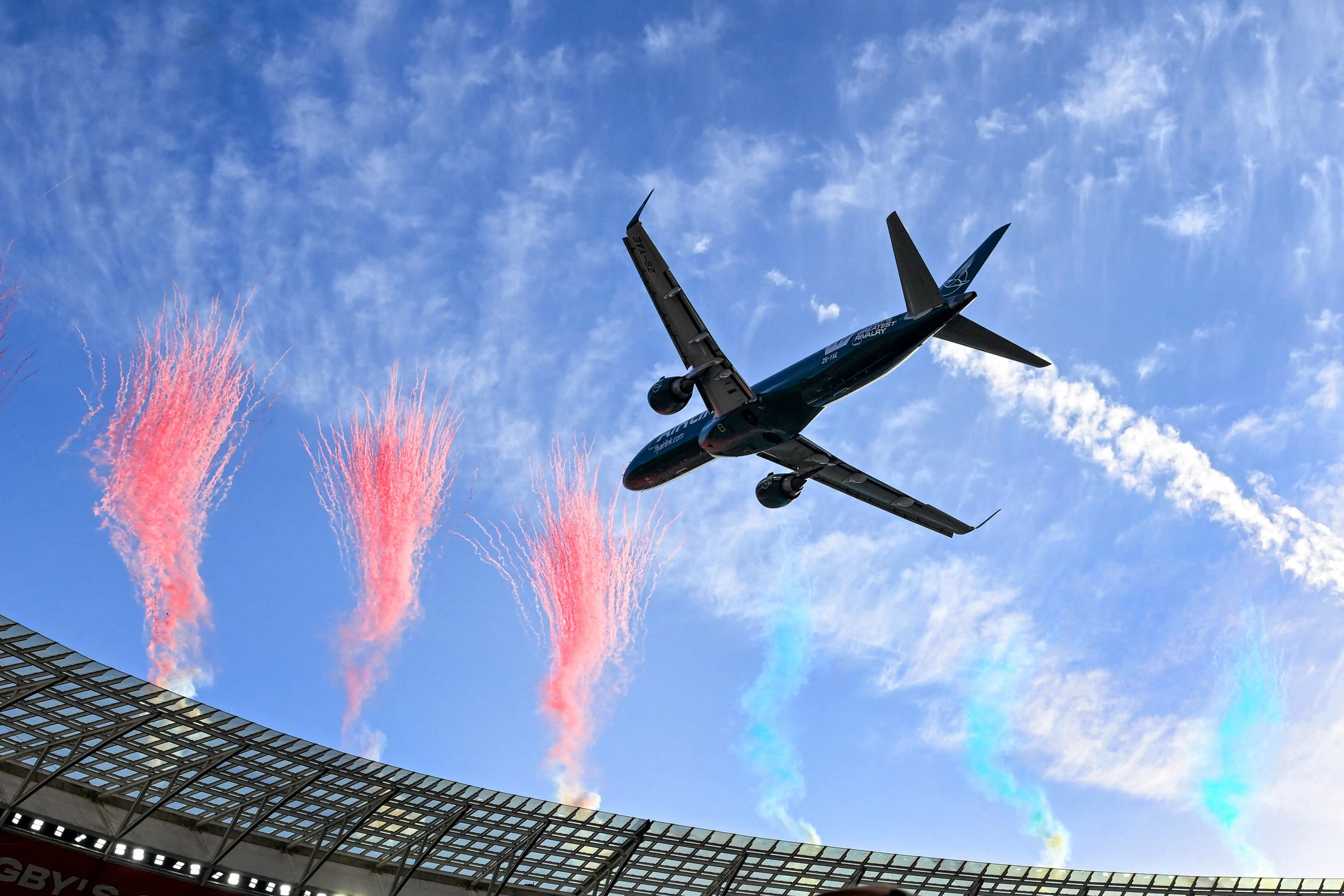 An aircraft performs a low flyover over the DHL Stadium before the Rugby Union match between South Africa's Springboks and New Zealand's All Blacks, in Cape Town, South Africa, August 29, 2026. REUTERS/Stringer