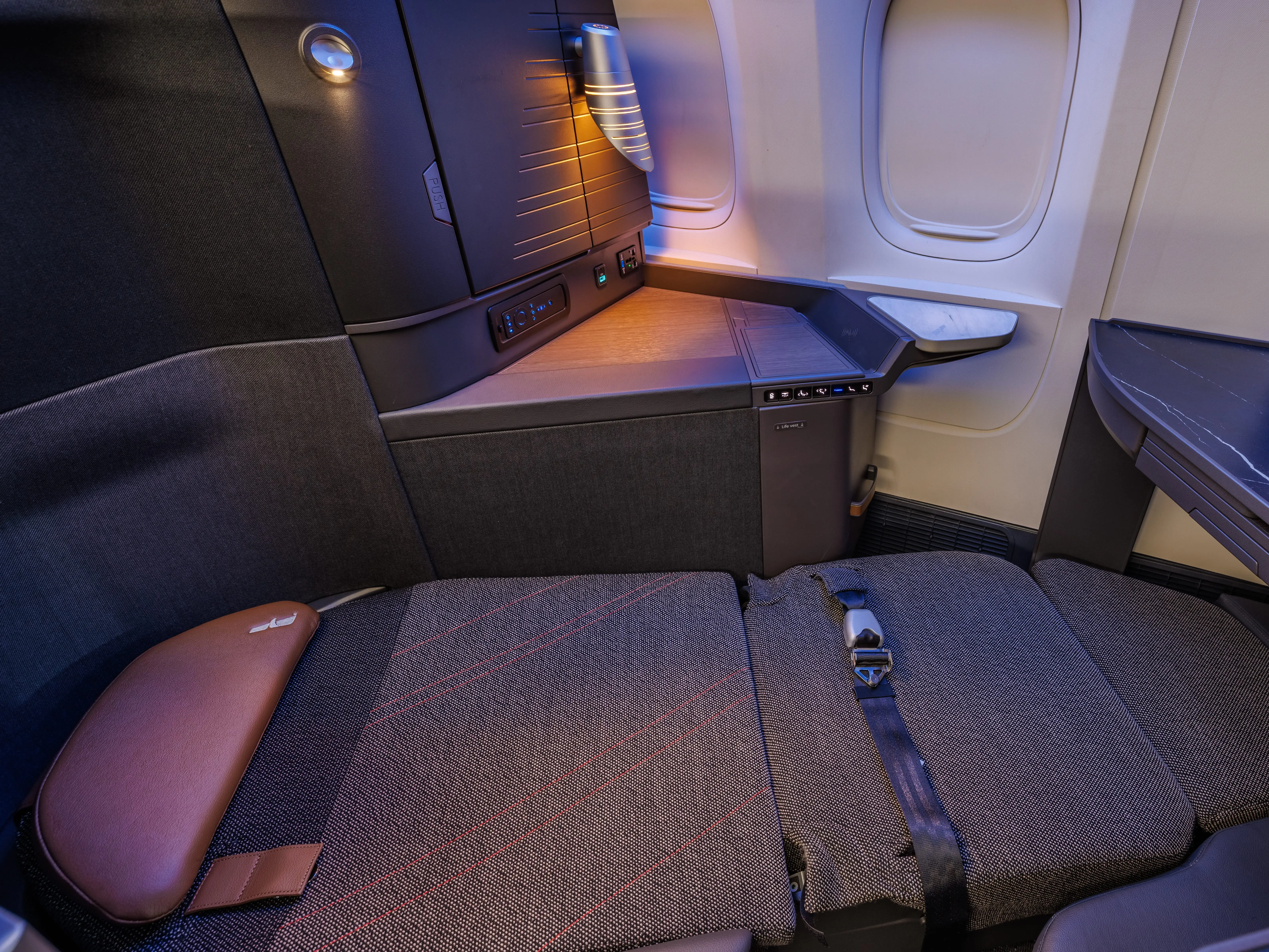 The AA flagship business class on 777 in lie-flat mode.