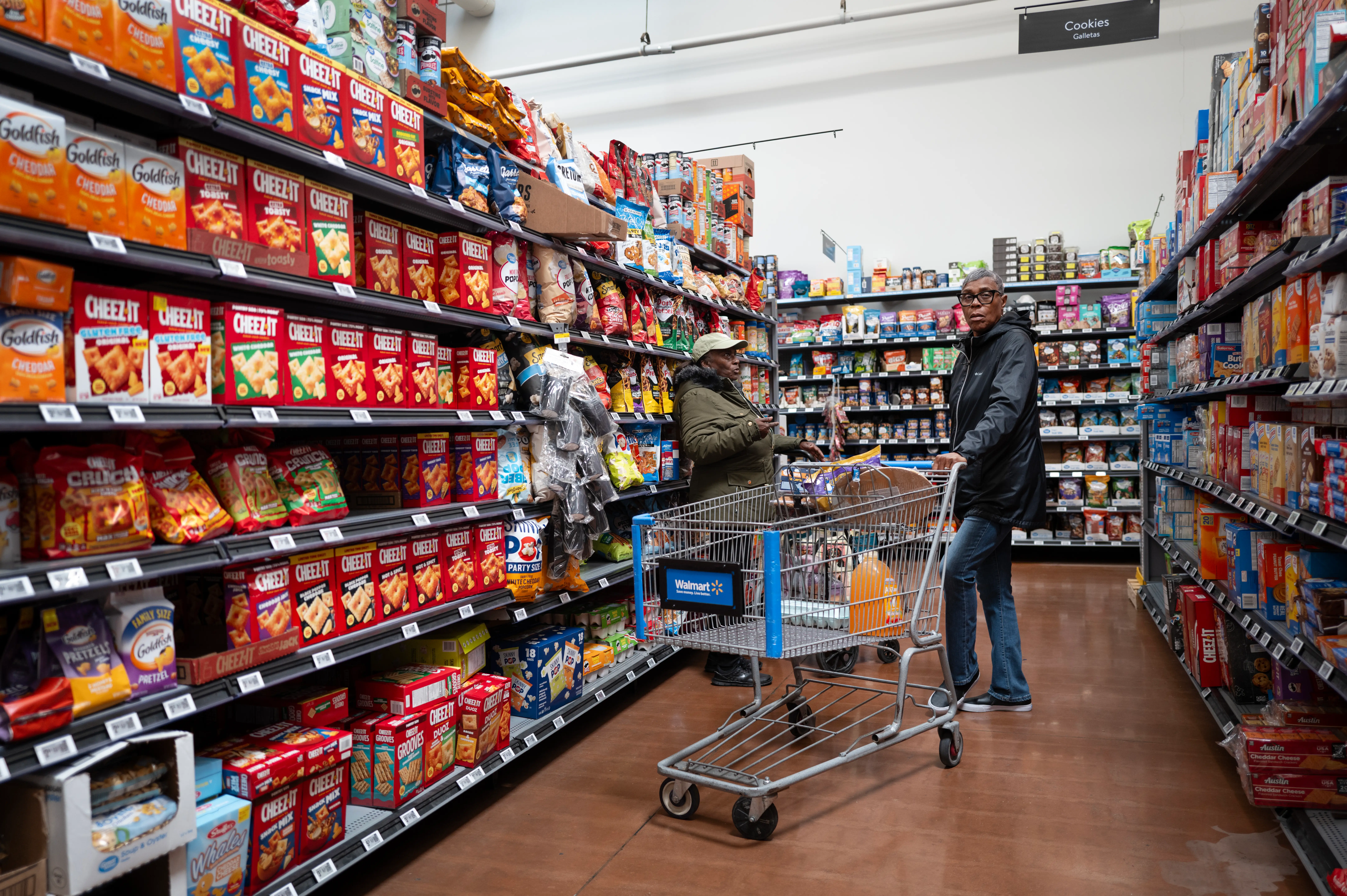 Customers shop at a Walmart store on May 13, 2026 in Chicago, Illinois.