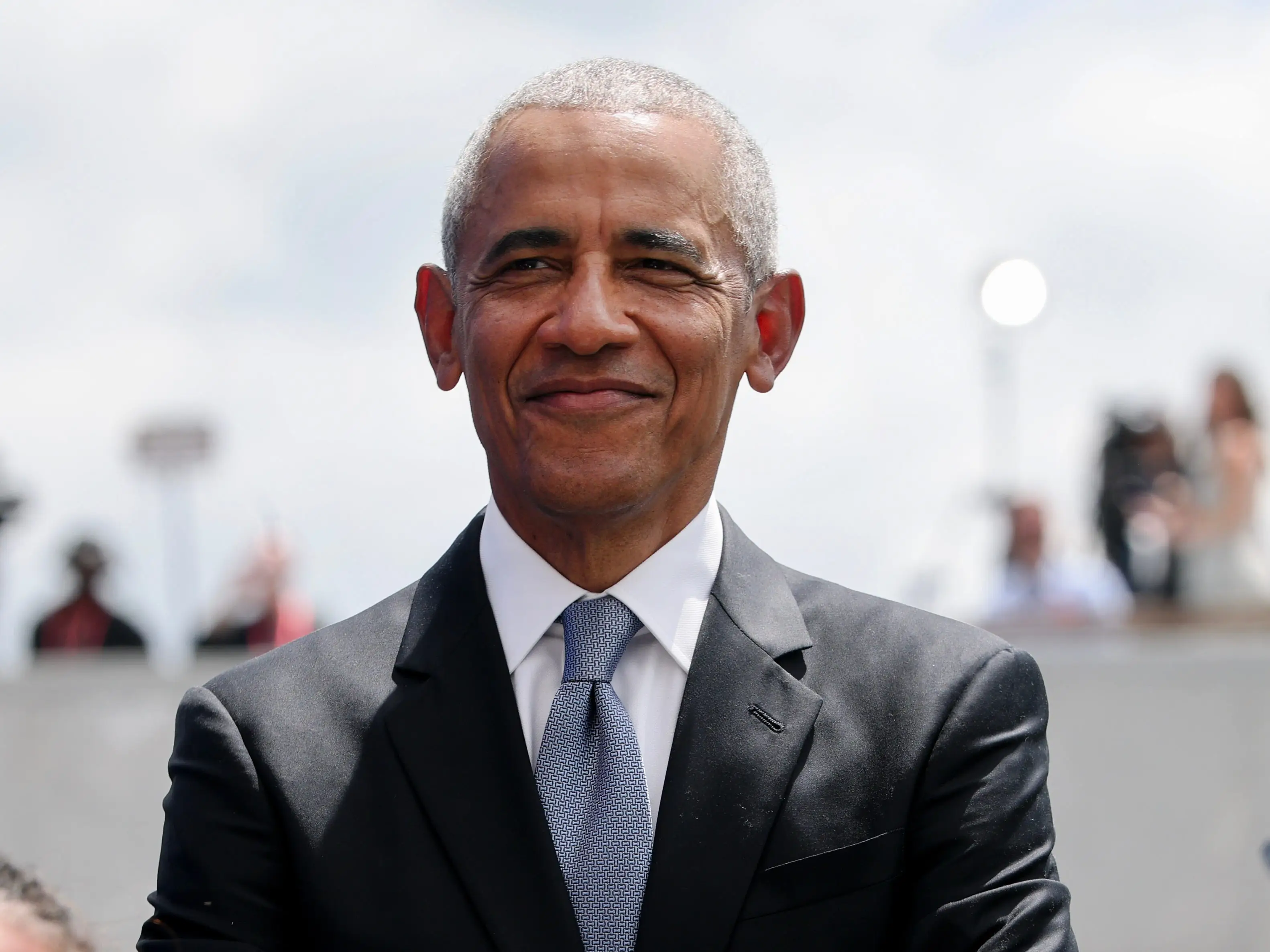 Former U.S. President Barack Obama stands on stage with daughter Sasha Obama during the dedication ceremony for the opening of the Barack Obama Presidential Center in John Lewis Plaza on June 18, 2026 in Chicago, Illinois.