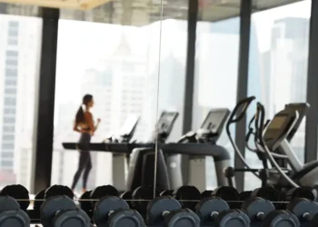 How do I convince my husband to let me get a fancy gym membership despite our credit card debt?