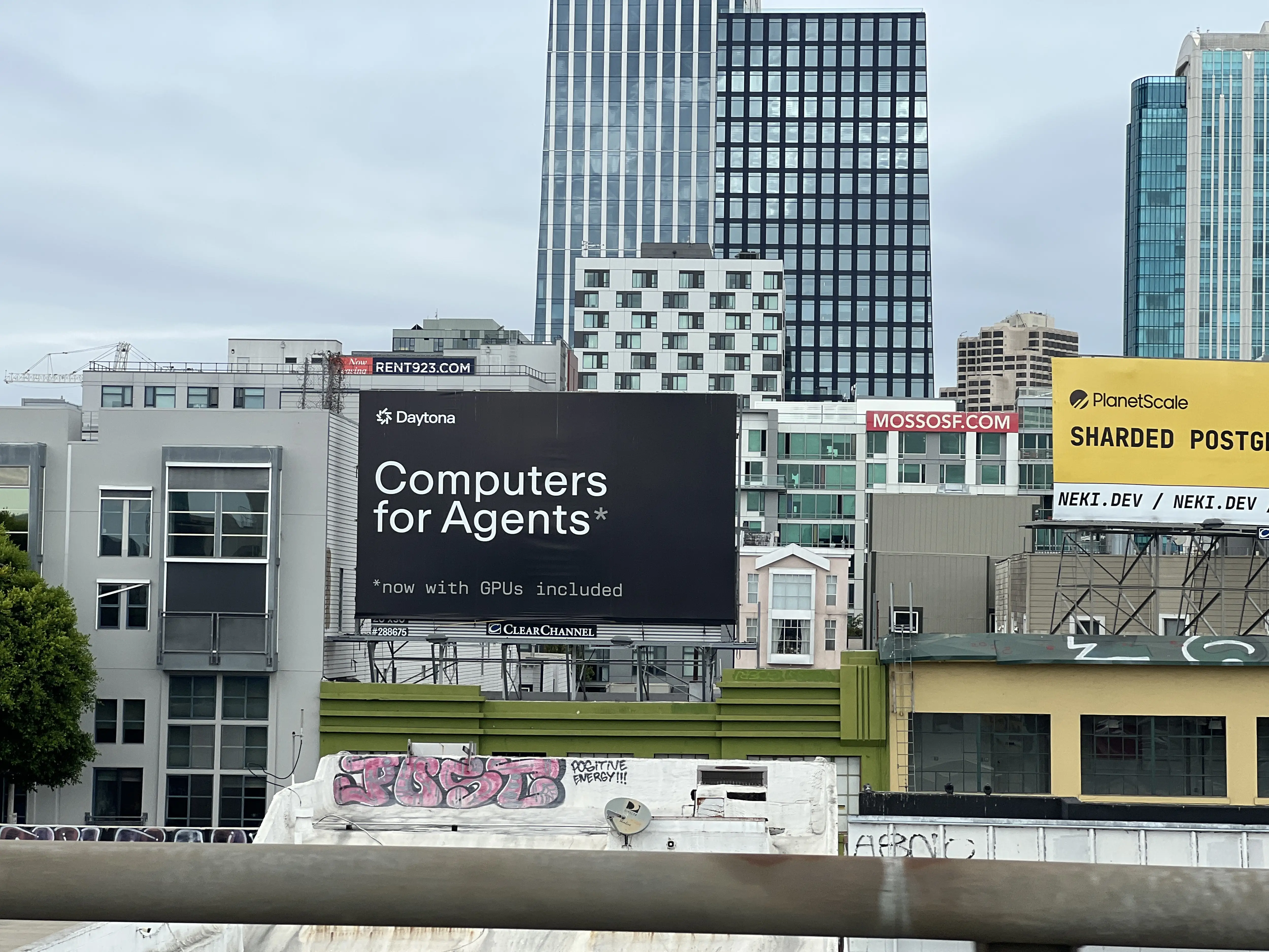 Billboards advertise Daytona computers for AI agents and PlanetScale's Neki sharded Postgres platform above buildings in the South of Market neighborhood, San Francisco, California, United States, September 3, 2026. (Photo by Smith Collection/Gado/Getty Images)