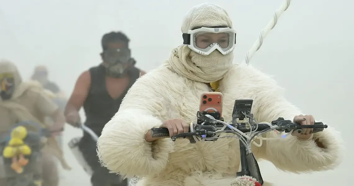 19 surreal photos show the mud, chaos, and glamour of Burning Man