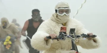 19 surreal photos show the mud, chaos, and glamour of Burning Man