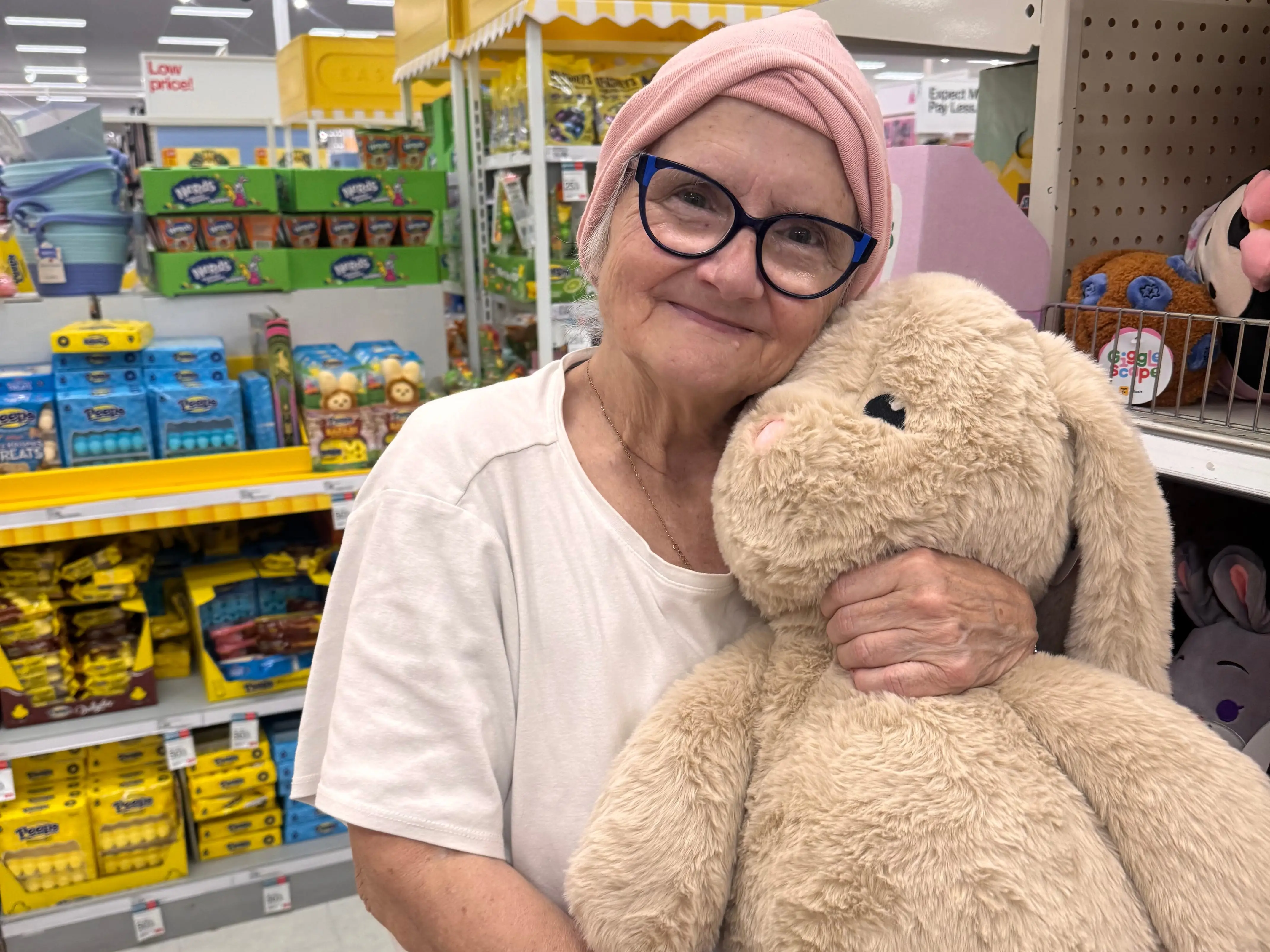 Woman holding stuffed bunny