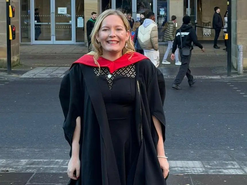 Woman in graduation gown