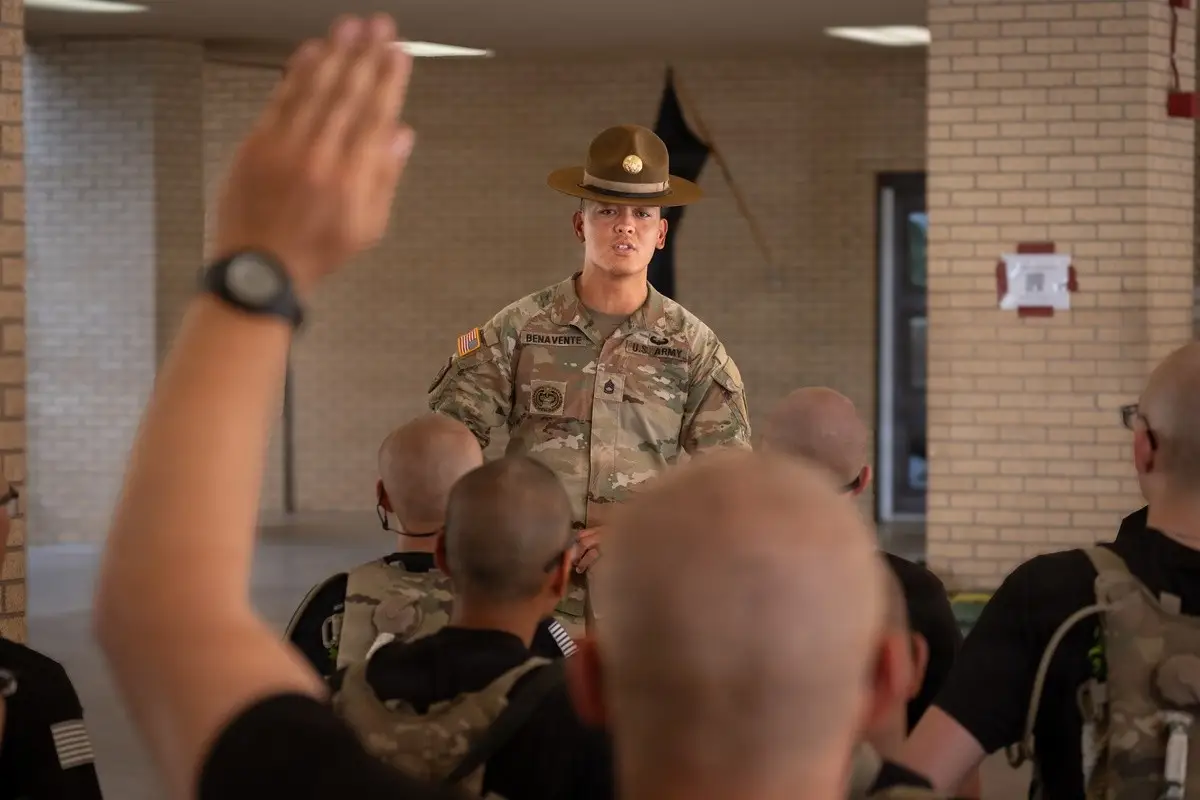An Army Reserve drill sergeant with 1st Brigade, 95th Training Division, speaks to trainees on Fort Sill, Okla., Aug. 16, 2026.