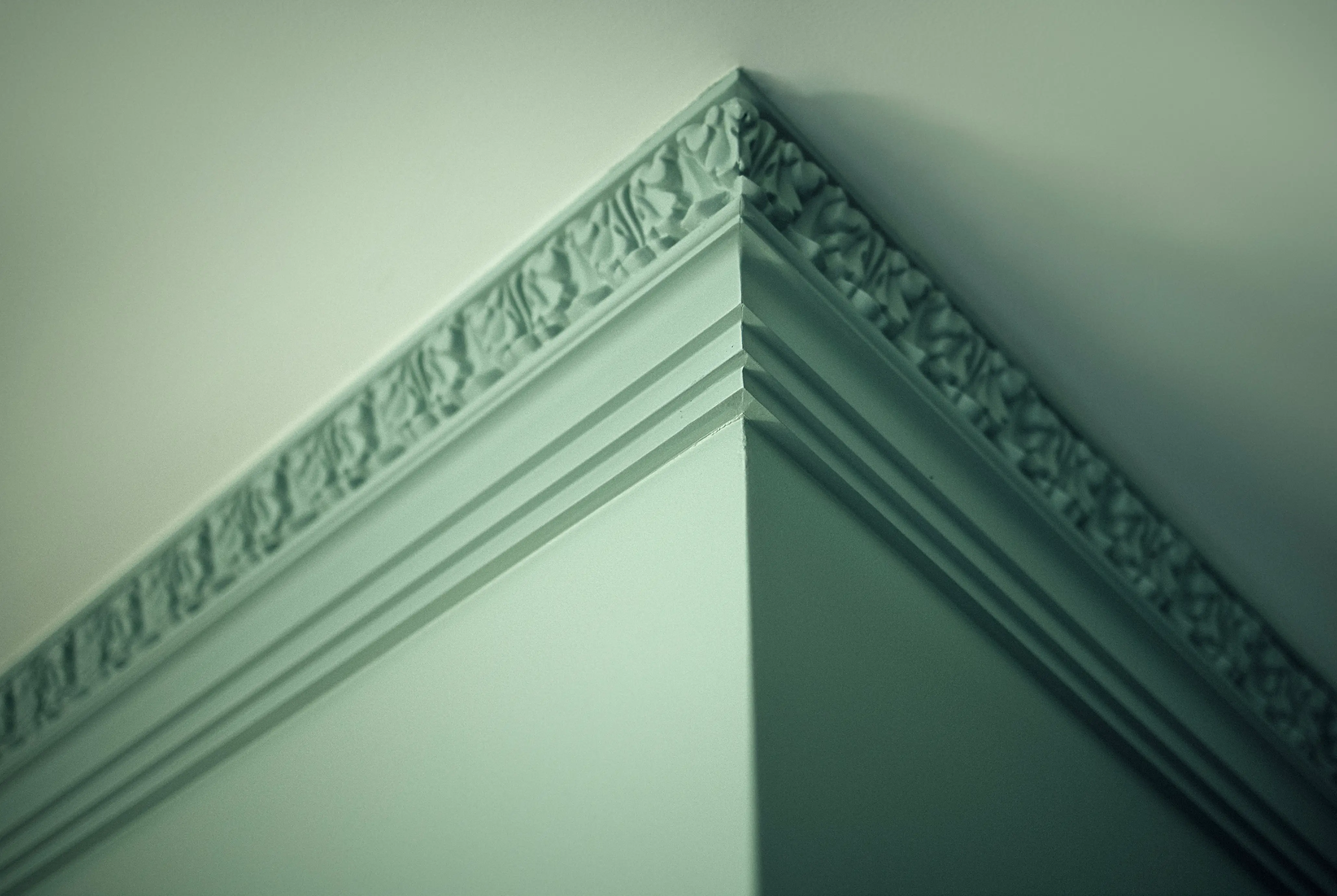 Close of up seafoam green ceiling, wall, crown molding