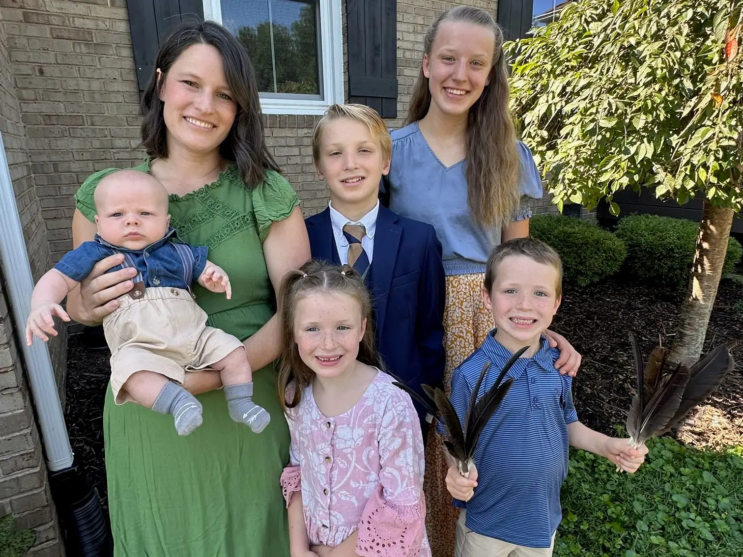 A mother with her five children.