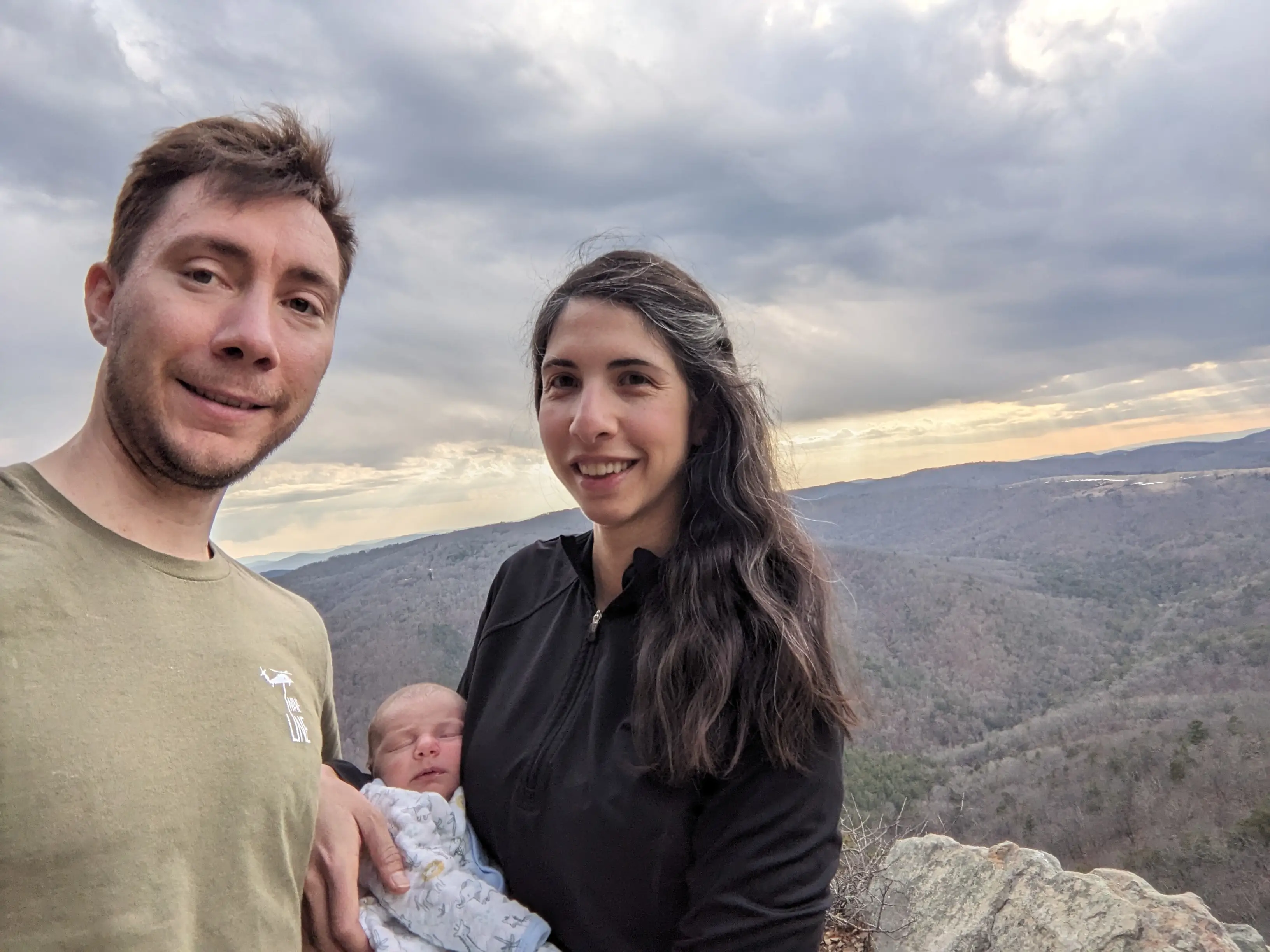 The author and her husband with their newborn while on a hie.