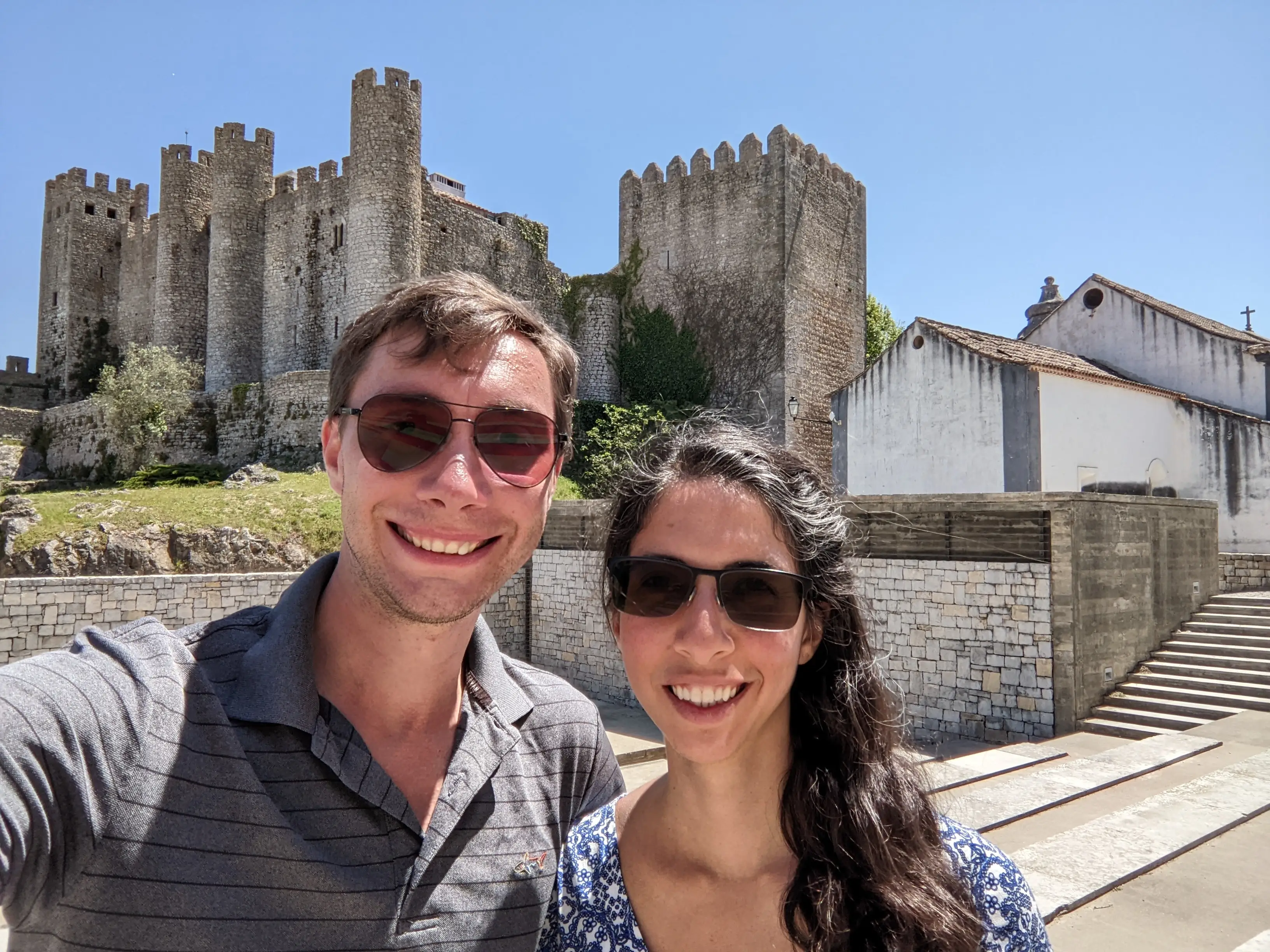 The author and her husband pose while on a road trip around Spain and Portugal.