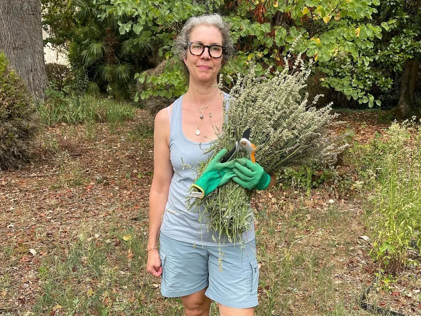 Woman holding bushel of lavendar