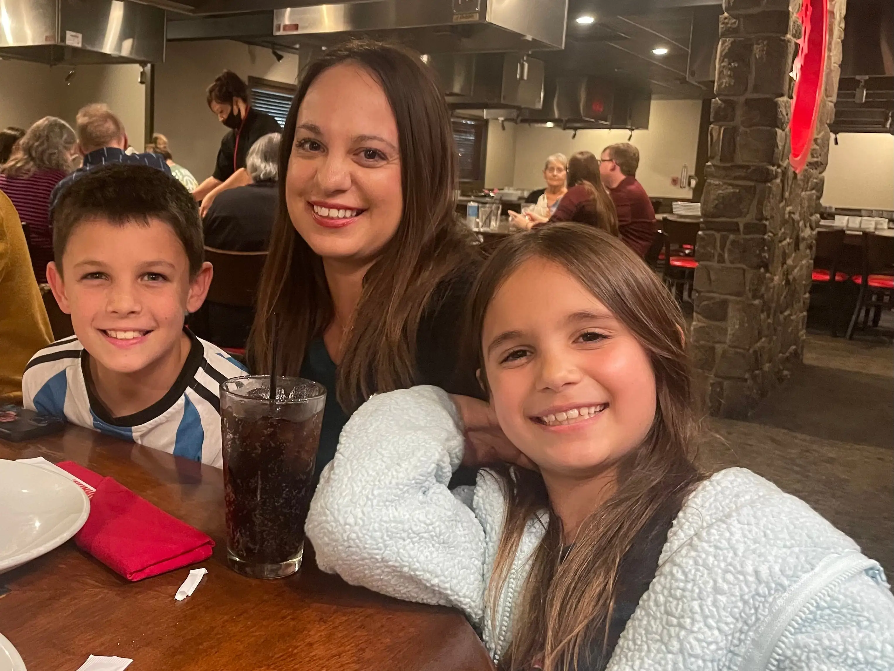 The author and her children dine at a hibachi restaurant.