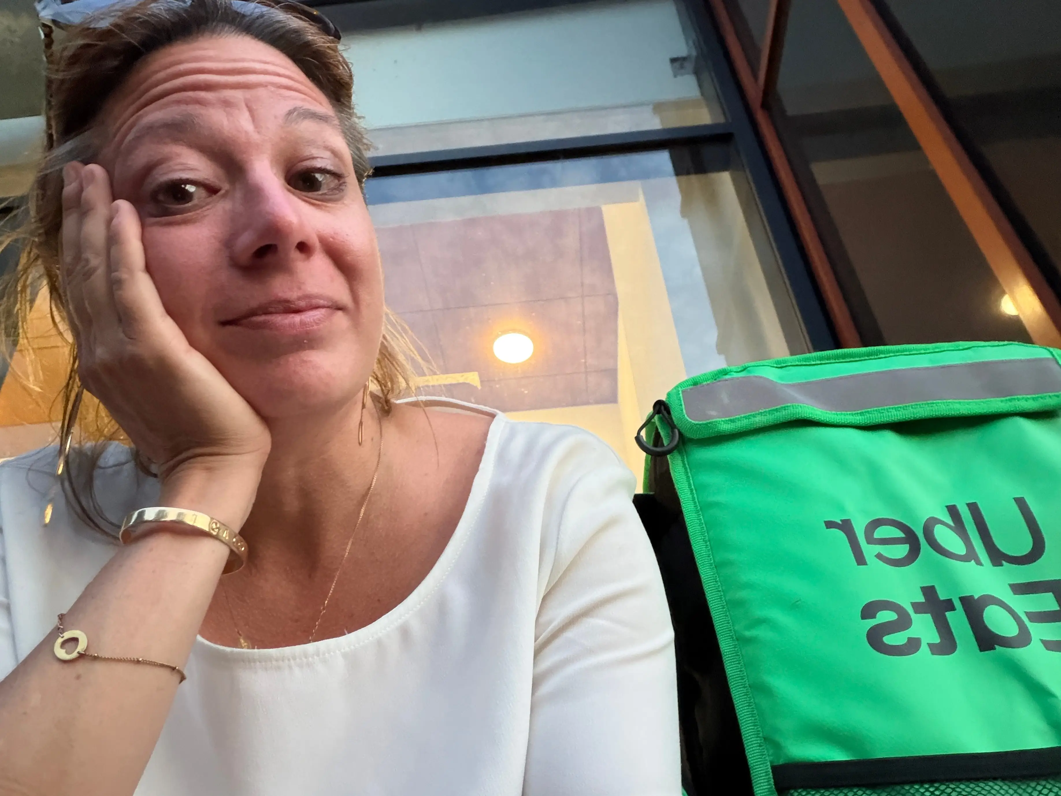 Woman with uber eats bag