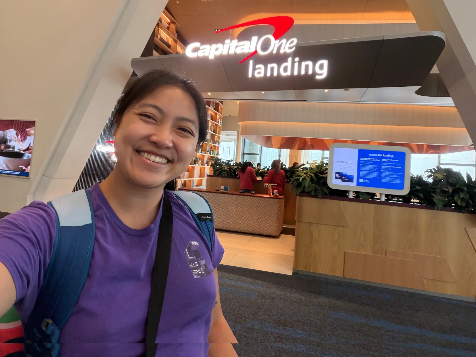 Selfie of the author in front of the Capital One Landing at LaGuardia Airport