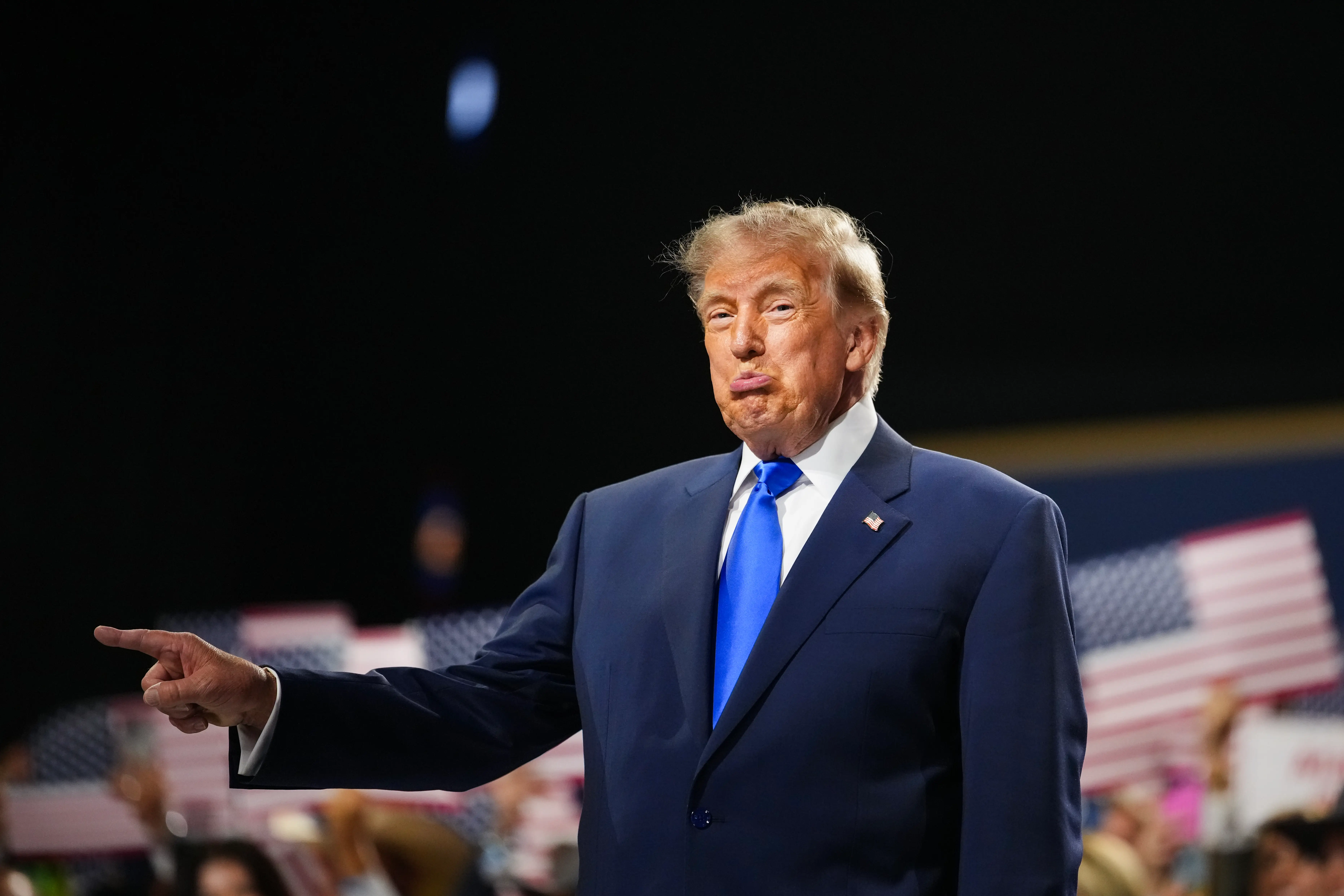 U.S. President Donald Trump walks on stage to speak on the first day of the 2026 Republican National Convention at the American Airlines Center on September 09, 2026 in Dallas, Texas. U.S.