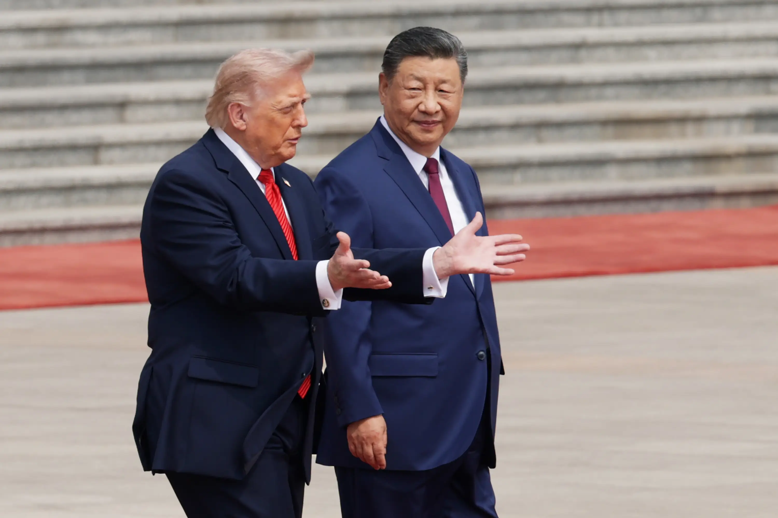 President Donald Trump and Chinese President Xi Jinping attend a welcome ceremony at the Great Hall of the People on May 14, 2026 in Beijing, China.