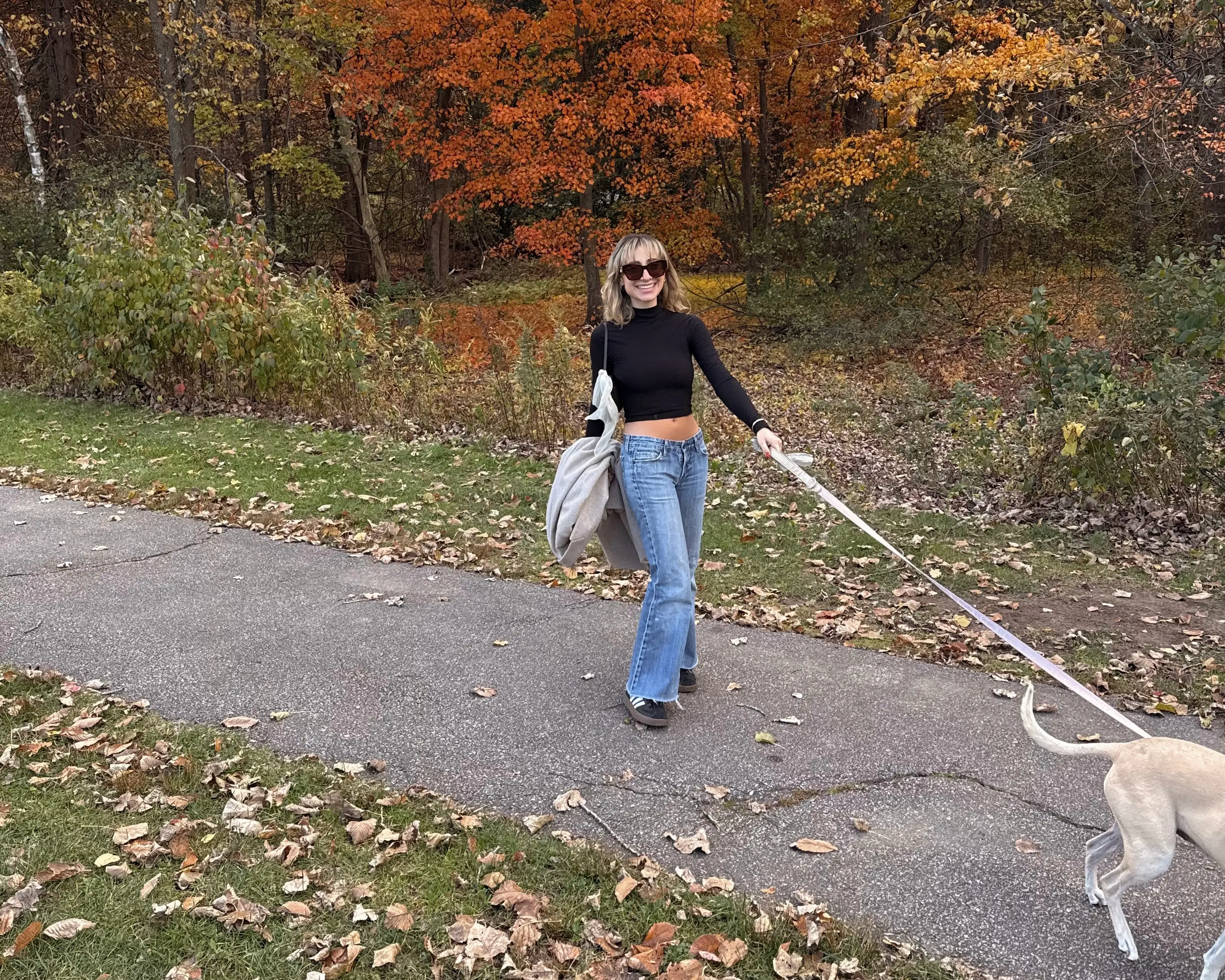 Woman walking dog