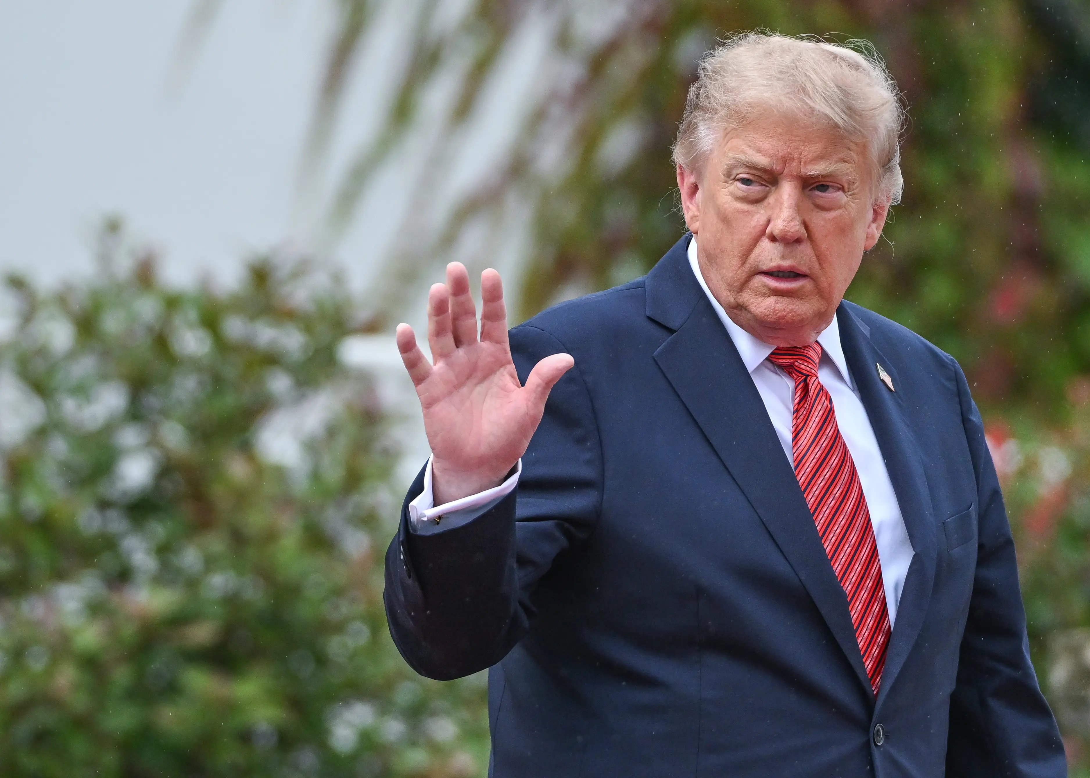 Donald Trump speaks to reporters