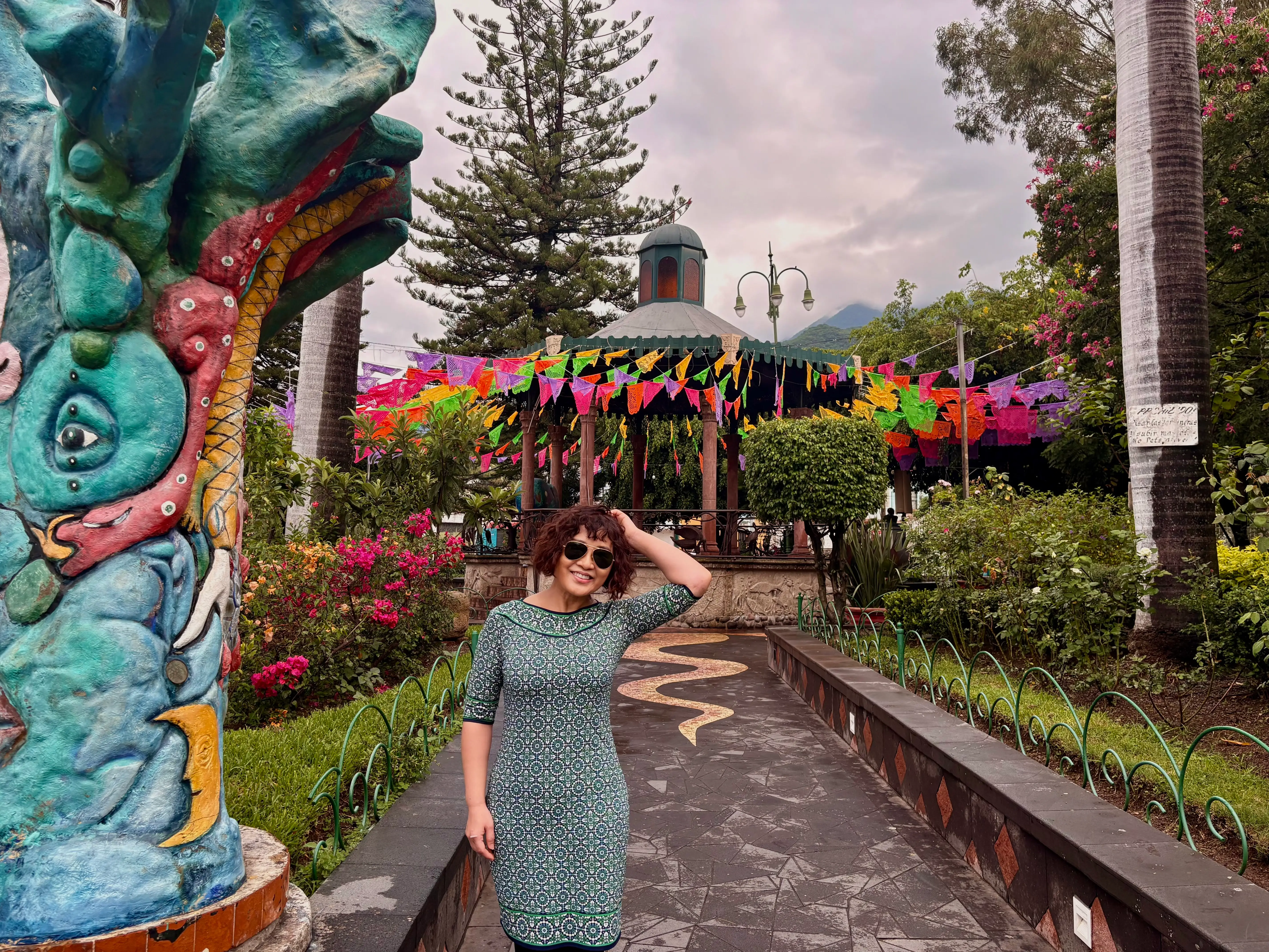 Woman smiling in garden kisok in Mexico