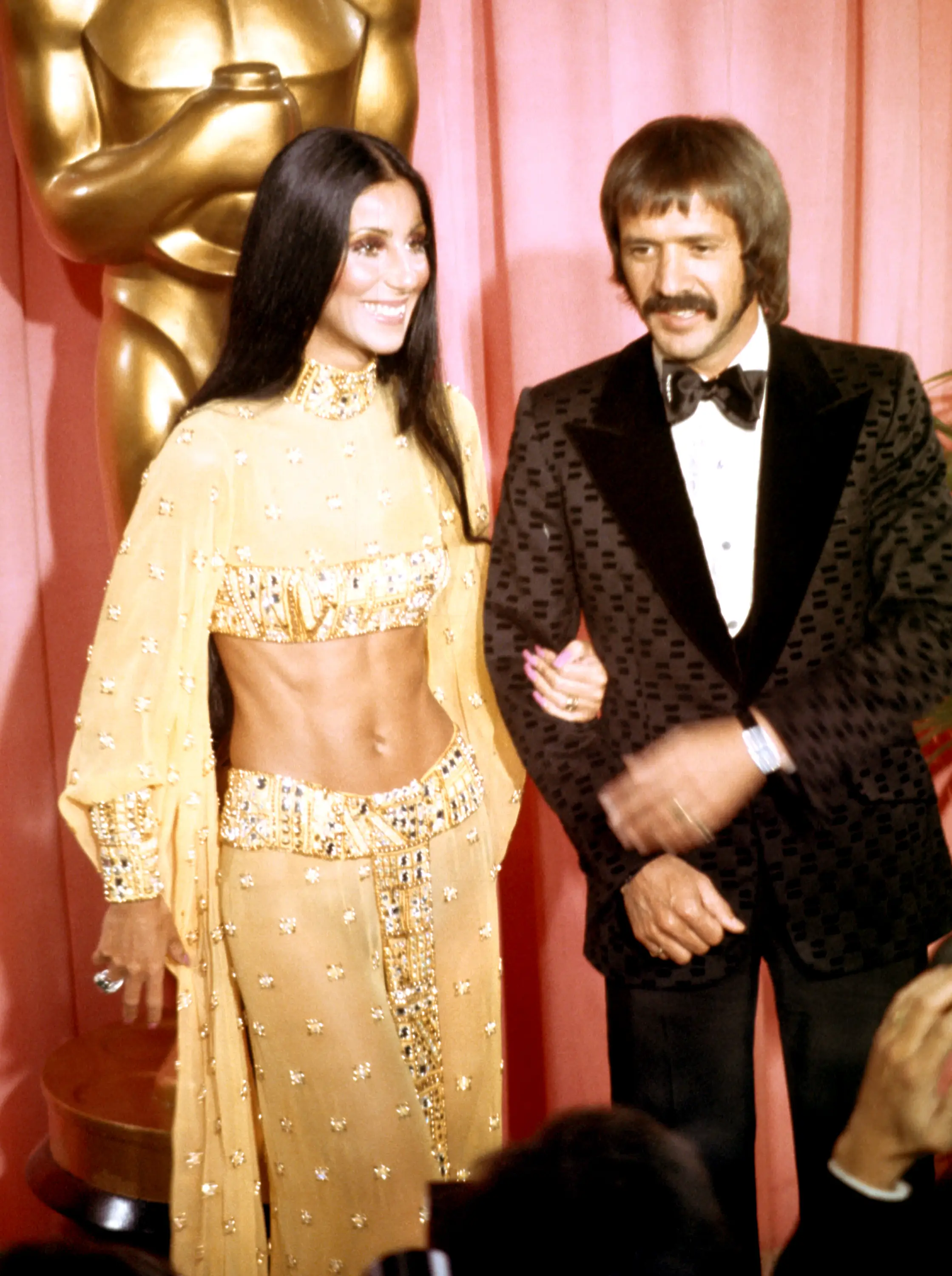 Entertainers Sonny Bono and Cher attend the Academy Awards ceremony at the Dorothy Chandler Pavilion on March 27, 1973 in Los Angeles, California.