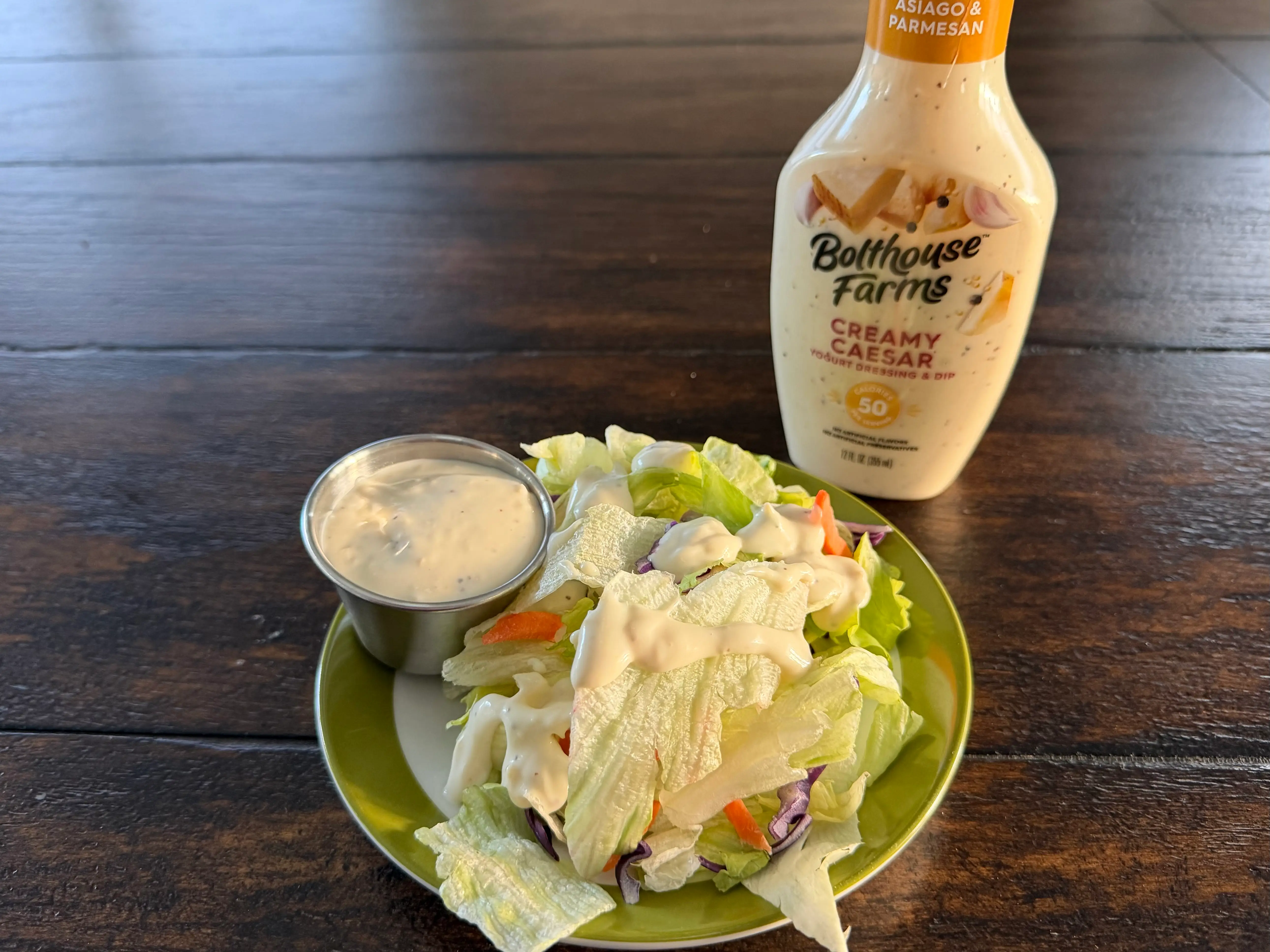 Bolthouse Farms dressing bottle next to small salad