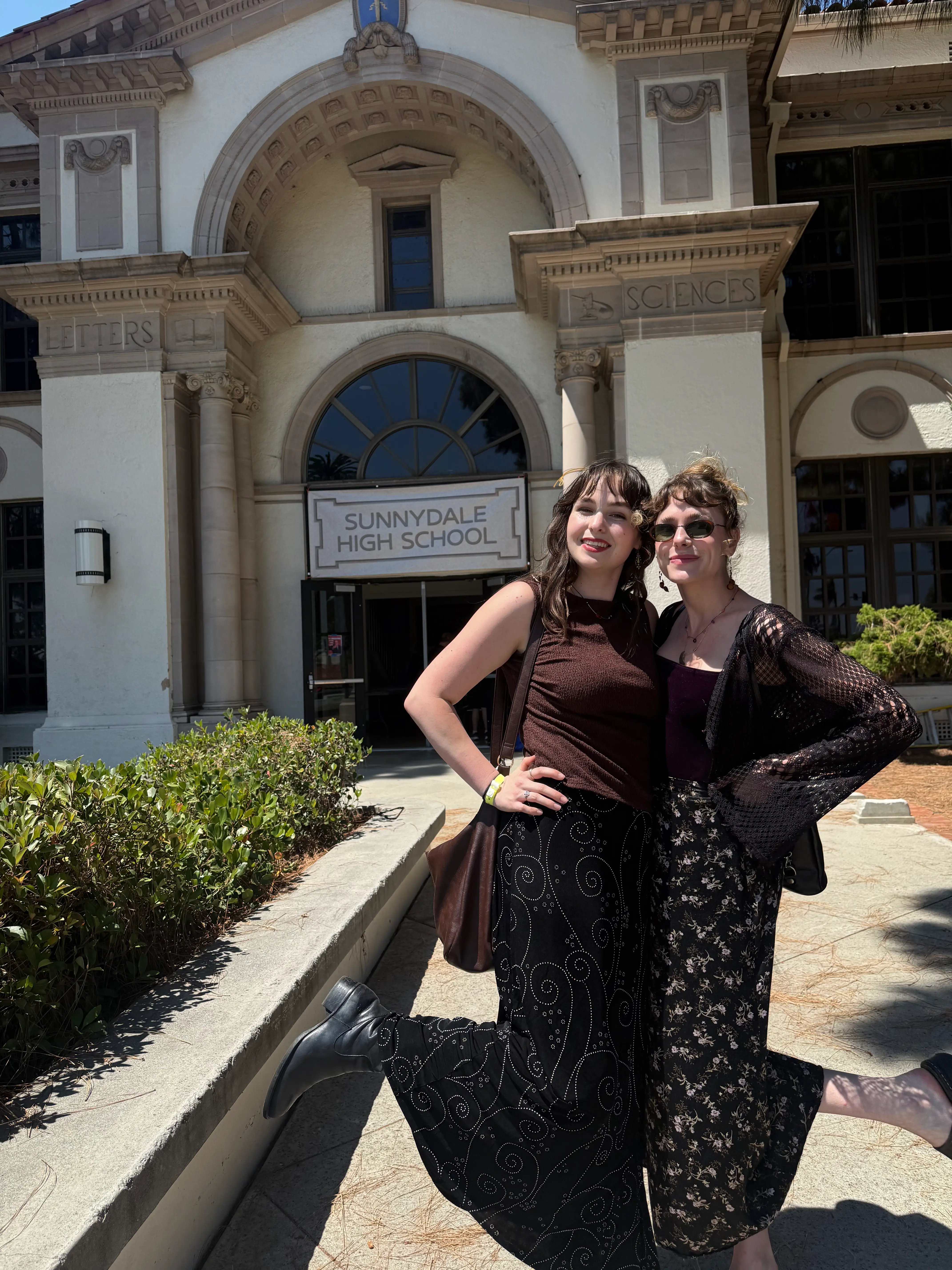 the author and her sister in front of sunnydale high school