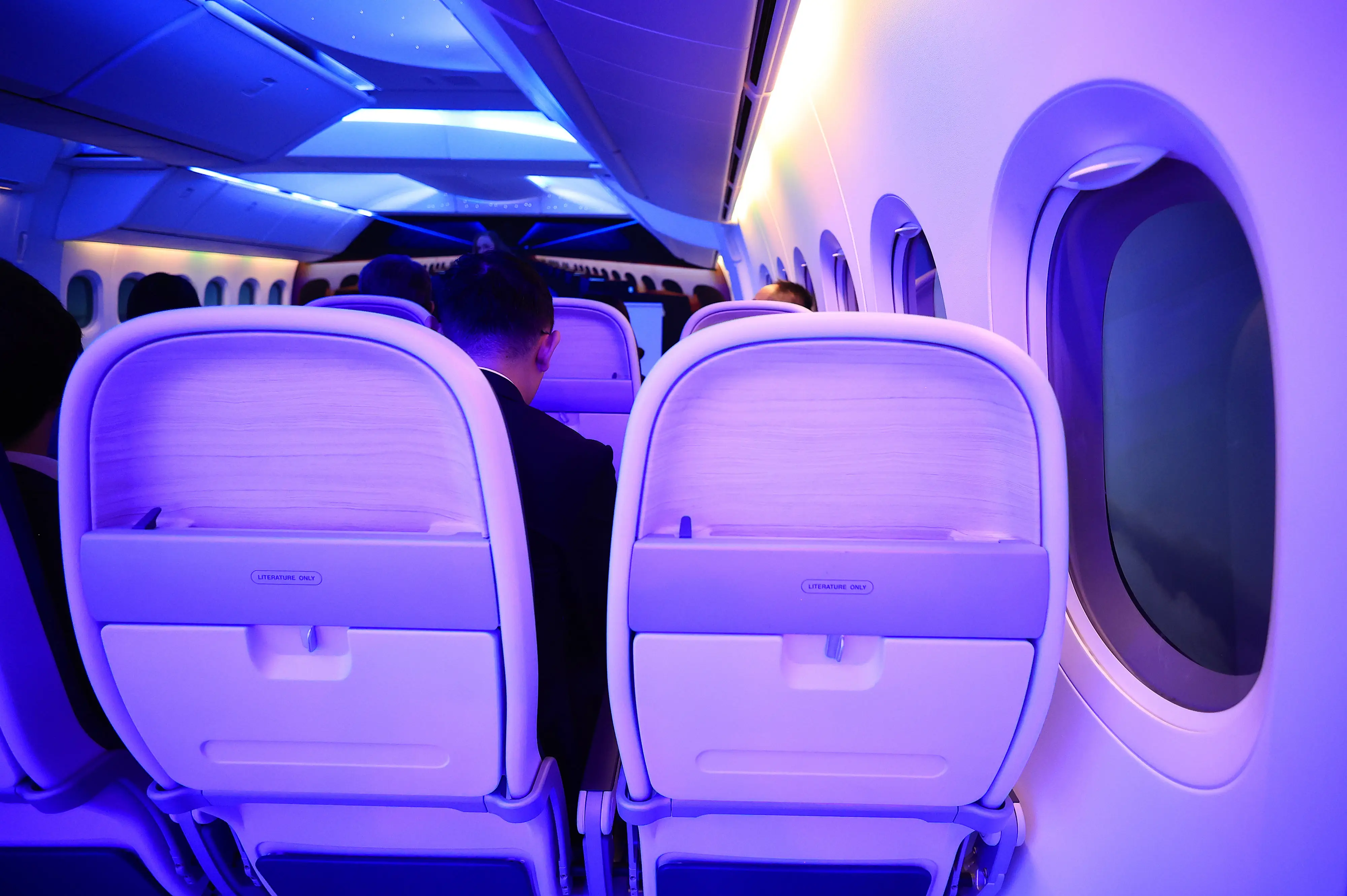 777x cabin mockup in Germany with blue lighting.